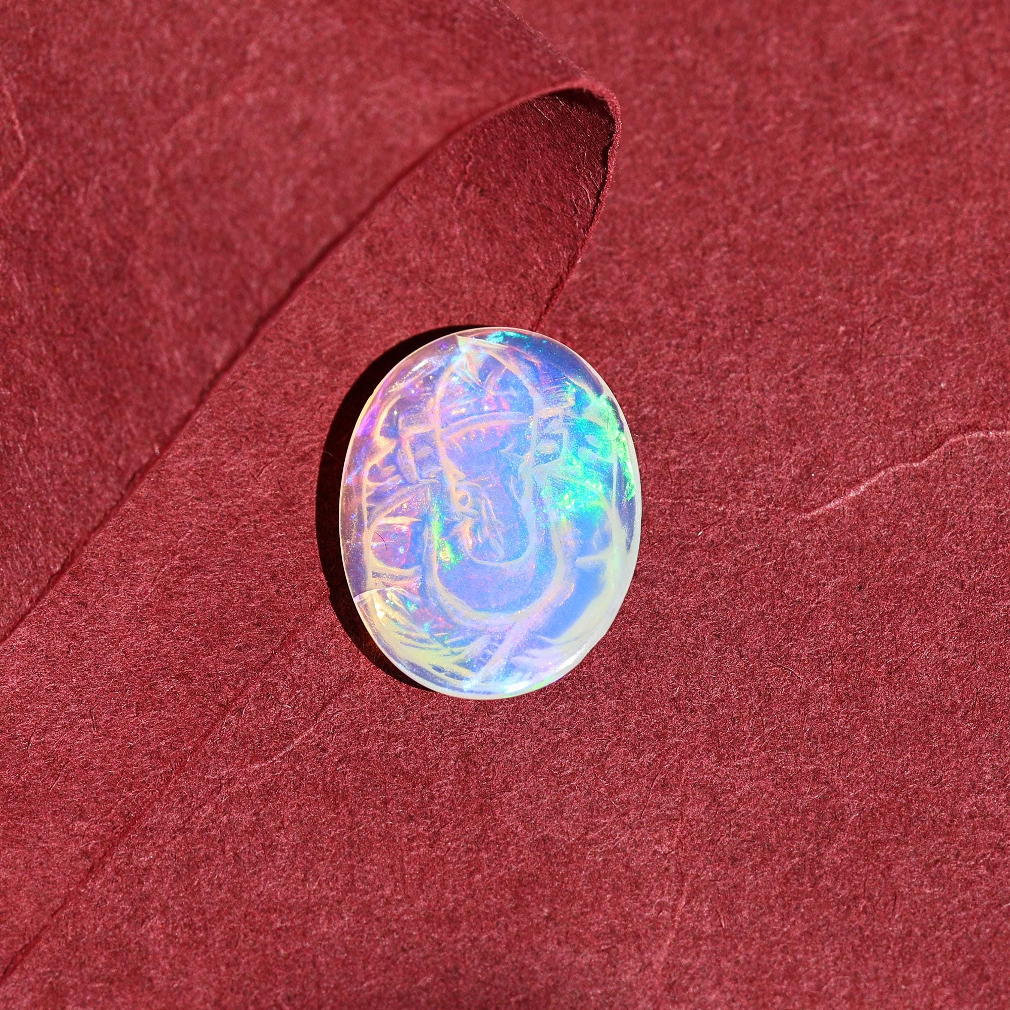 Carved Opal Ganesha Statue: 5.60 Carat Ethiopian Gemstone Carving