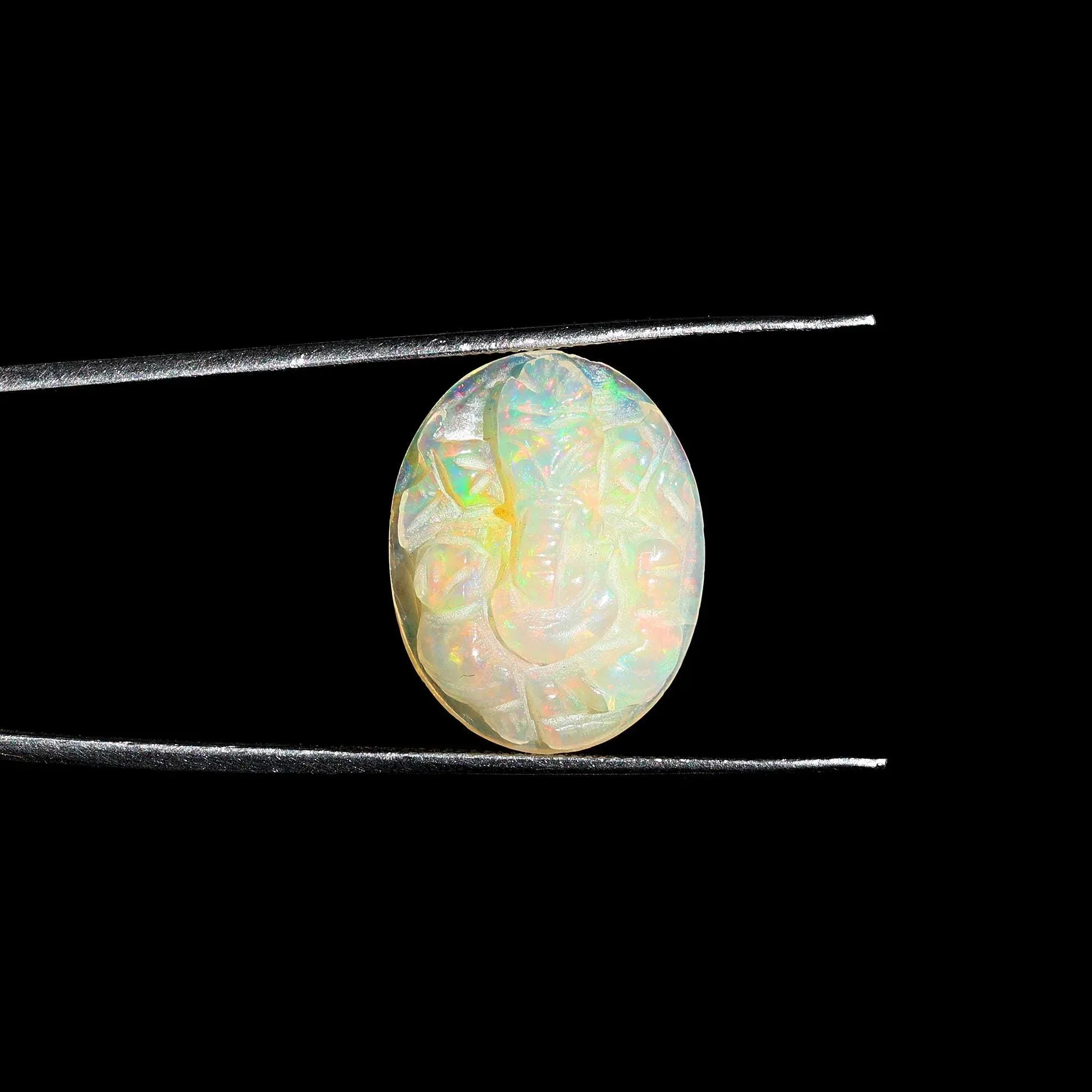 Hand-Carved Ethiopian Opal Ganesha Statue: Spiritual Home Decor (15x19mm, 7.50 Carat) loose gemstones