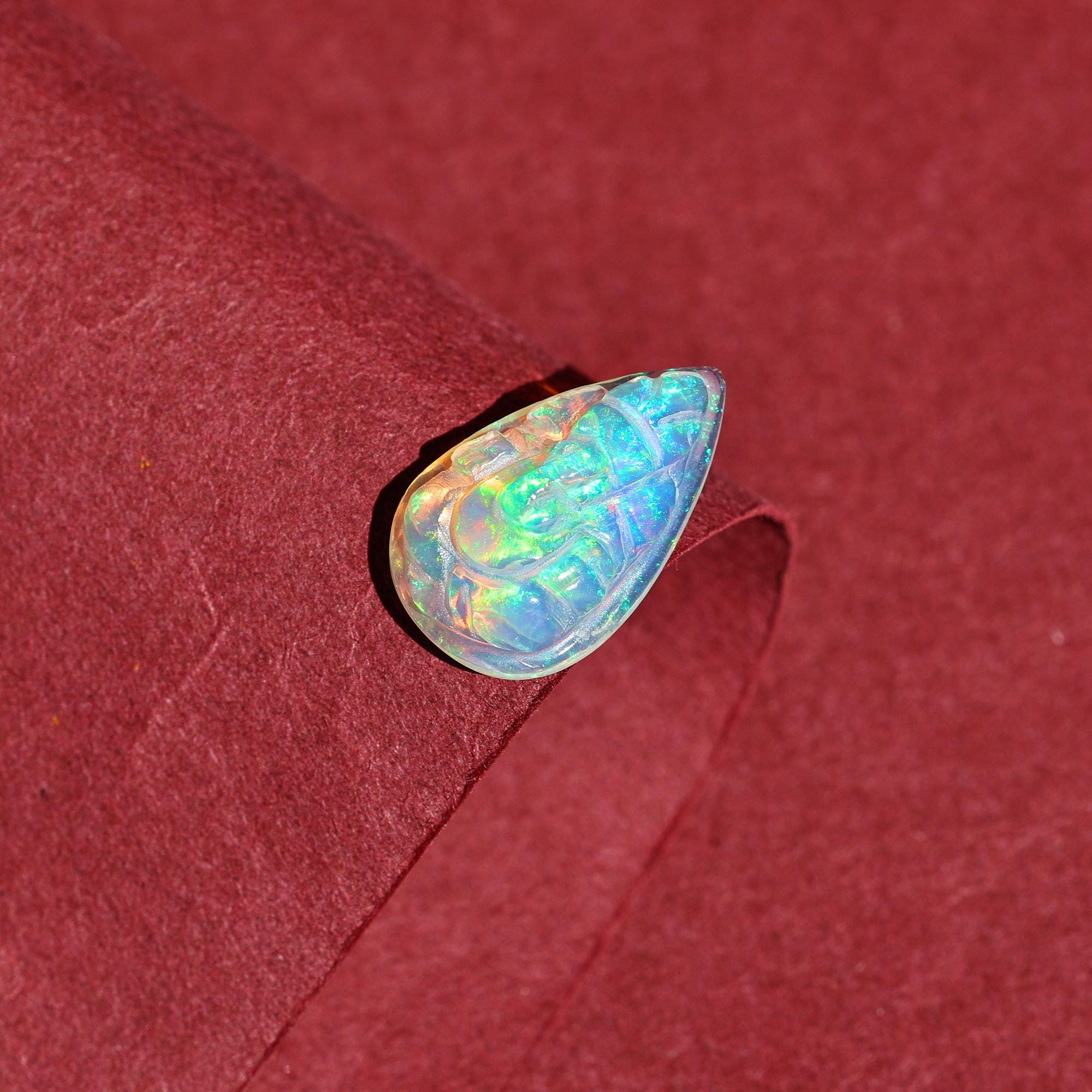 Ethiopian Opal Ganesha Carving: Pear Gemstone (11x18mm)