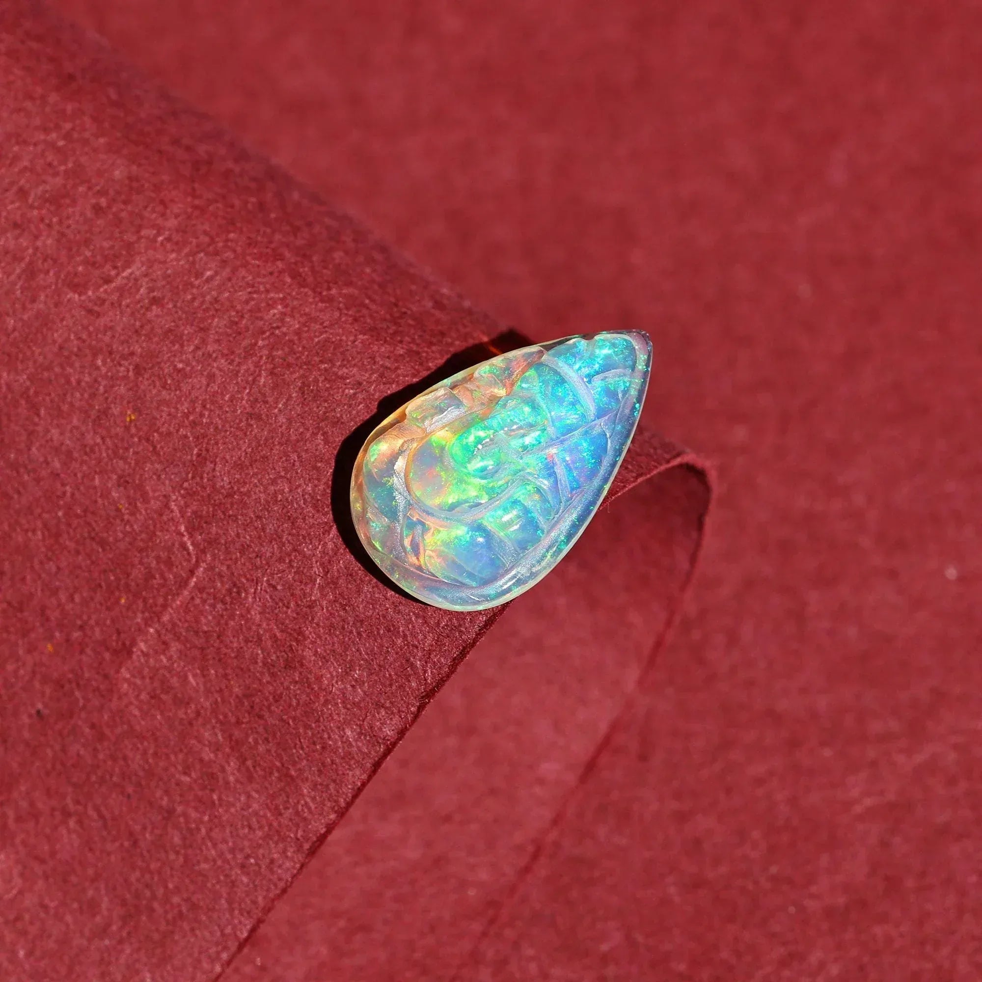 Ethiopian Opal Ganesha Carving: Pear Gemstone (11x18mm) loose gemstones