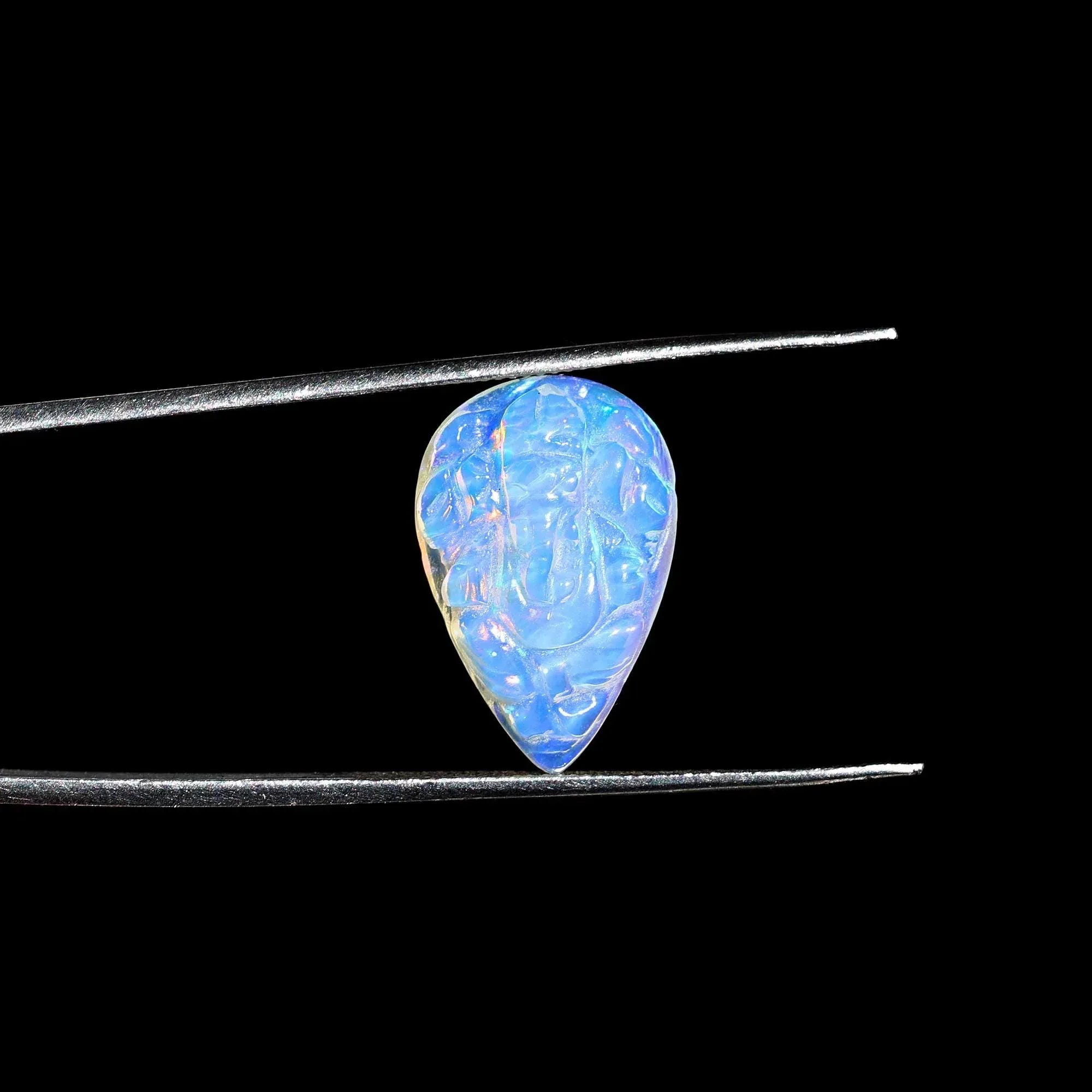 Carved Opal Ganesha: 4.70 Carat Pear-Shaped Gemstone loose gemstones