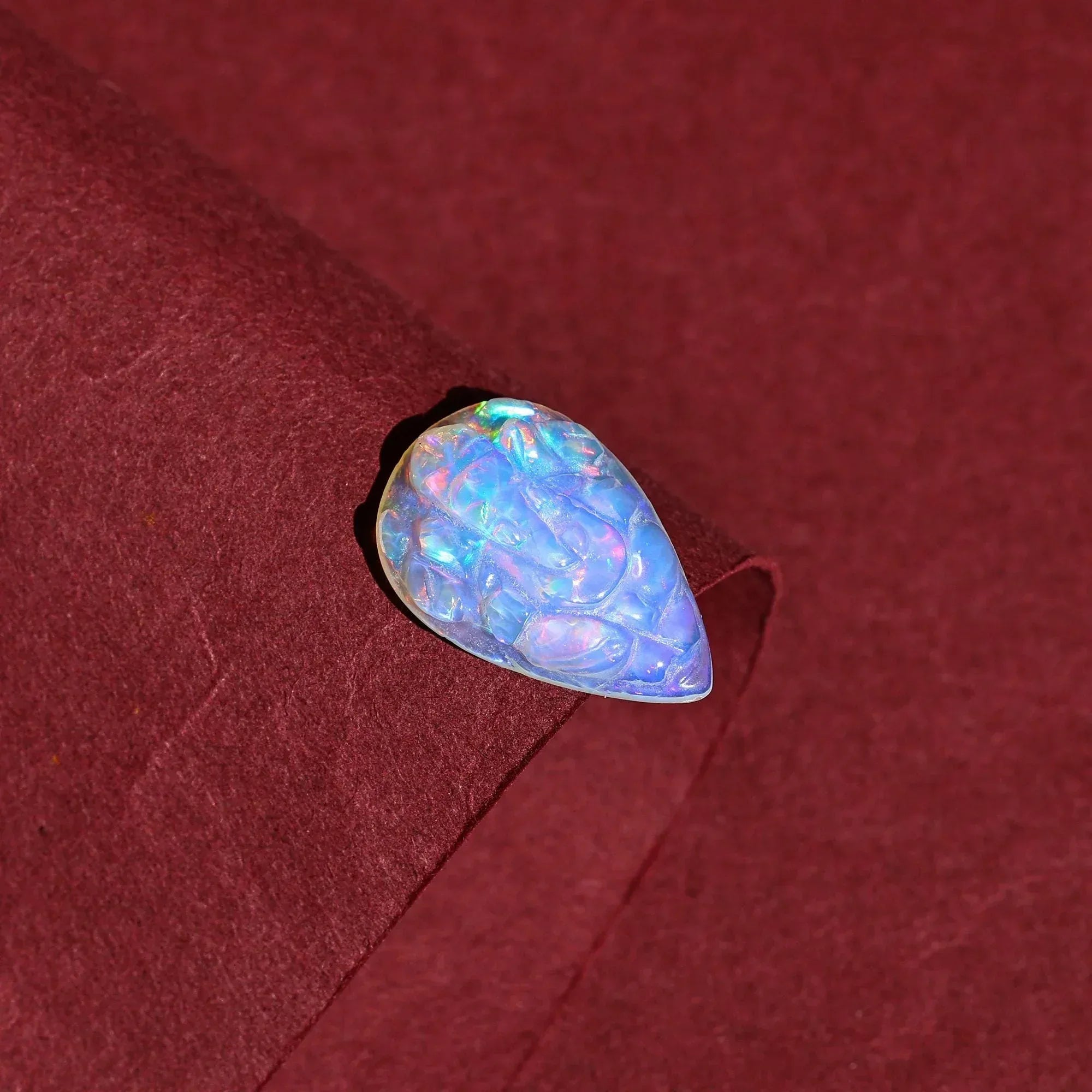 Carved Opal Ganesha: 4.70 Carat Pear-Shaped Gemstone loose gemstones