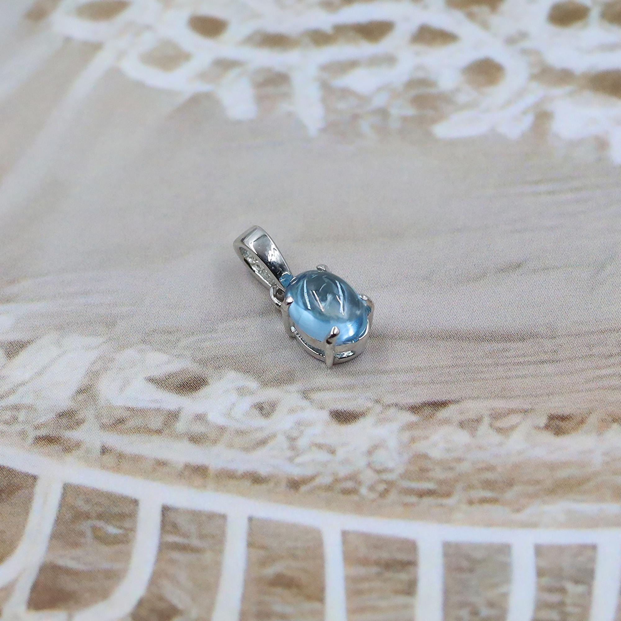 Handmade Swiss Blue Topaz Sterling Silver Pendant: December Birthstone