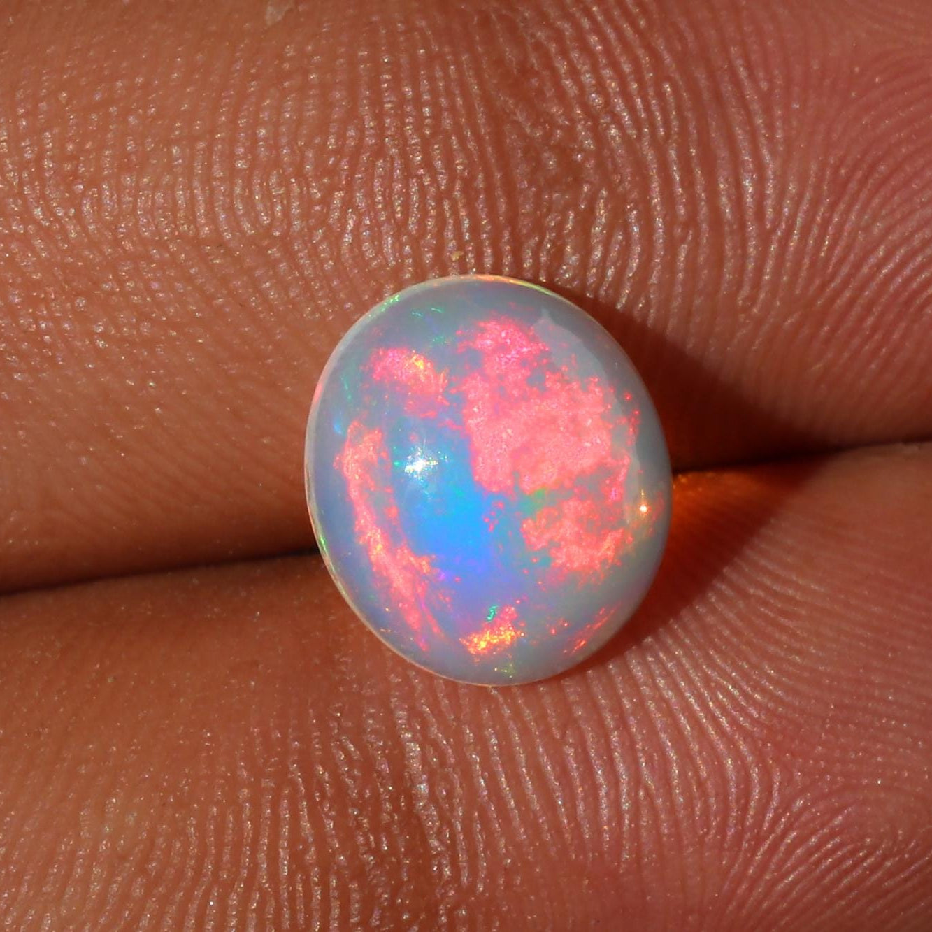 Ethiopian Opal Gemstone: 2.5 Ct Oval Cabochon Multi-Color Fire Play