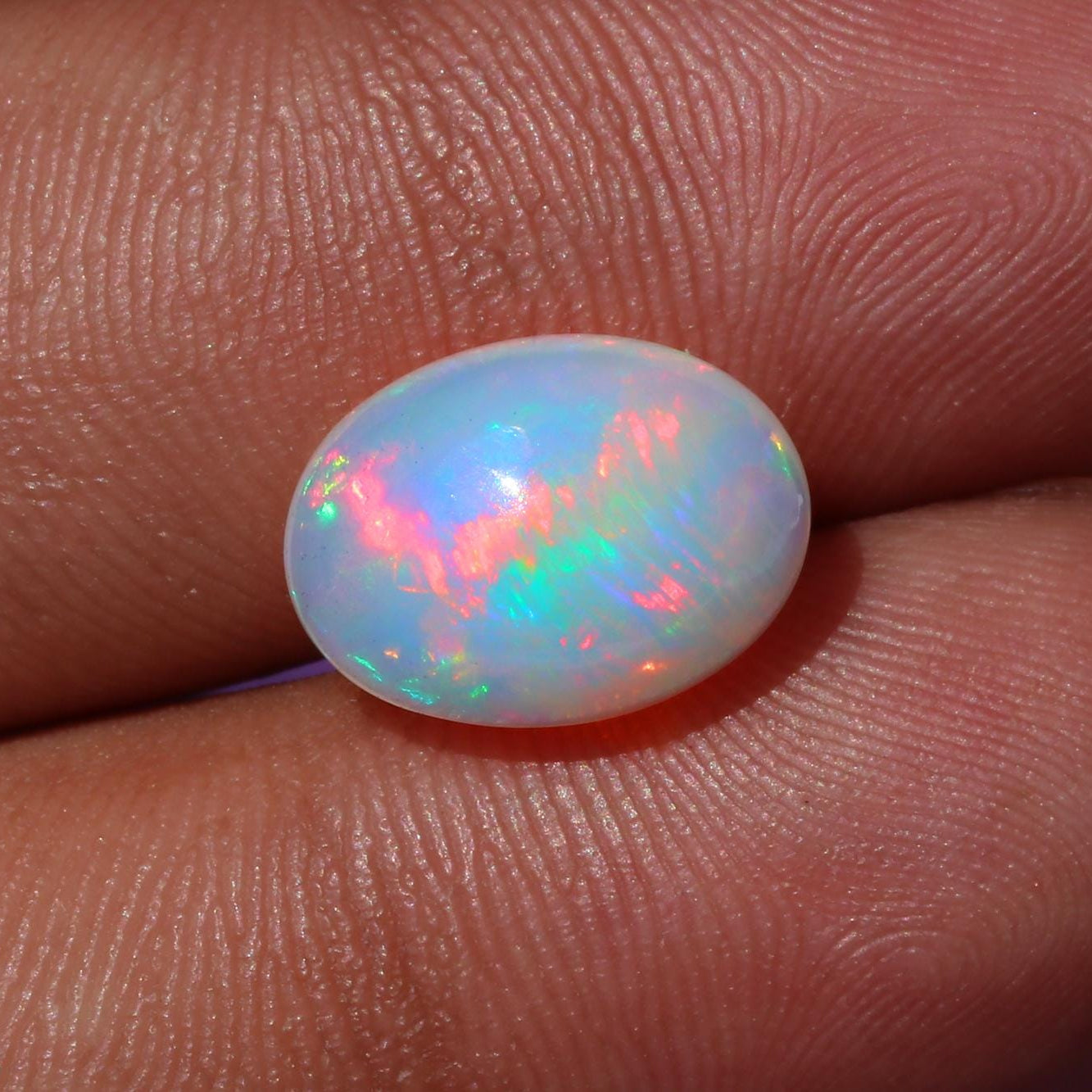 Ethiopian Opal Gemstone: Oval Rainbow Cabochon, 4.02 ct (10x13mm)