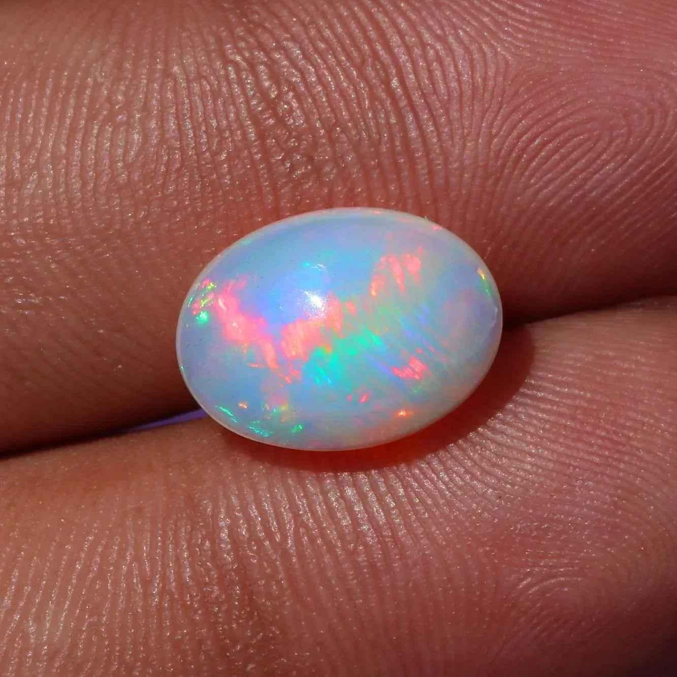 Ethiopian Opal Cabochon 4.02 ct Oval Rainbow Gemstone 10x13mm loose gemstones