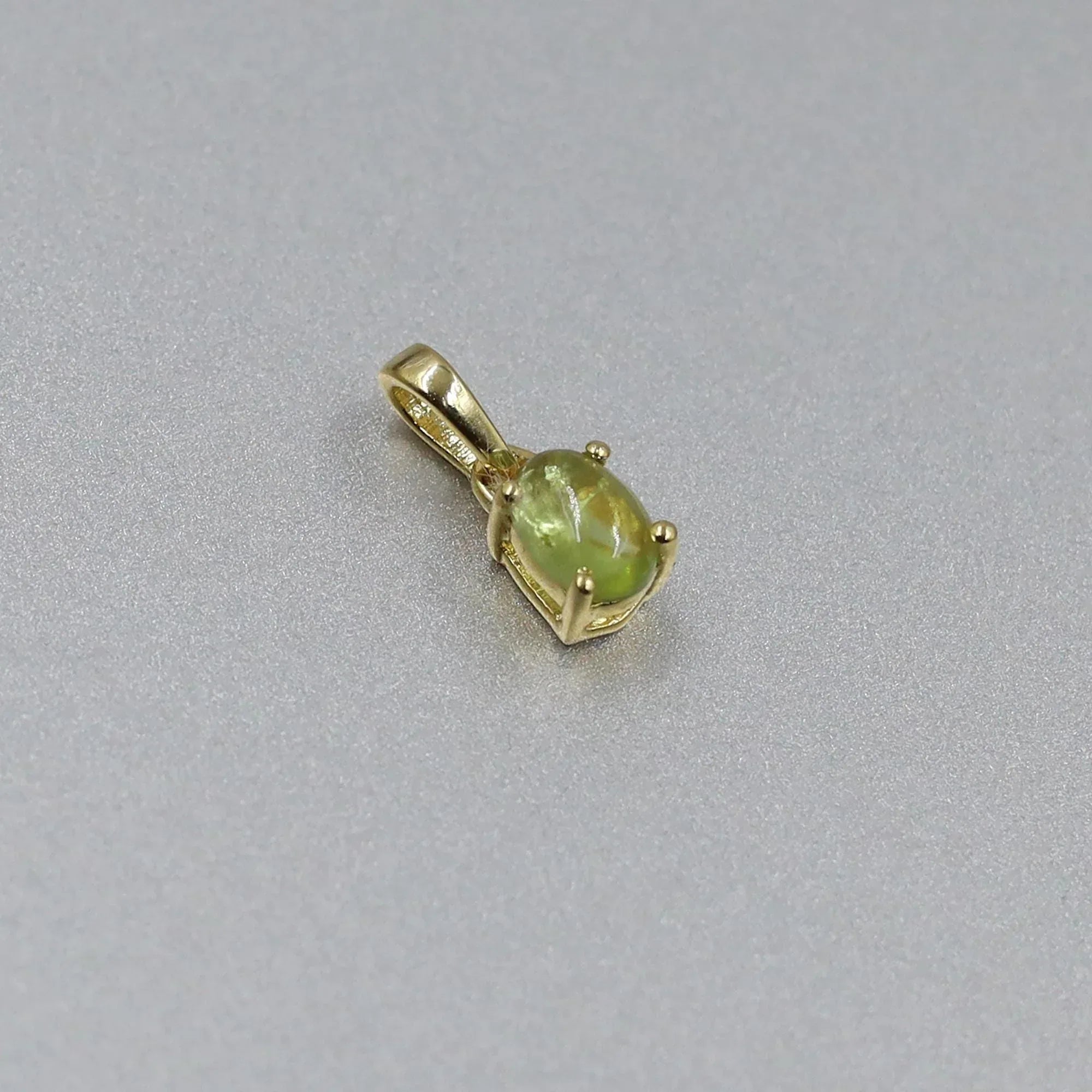 Natural Peridot Pendant: Oval Green Gemstone, Sterling Silver Necklace