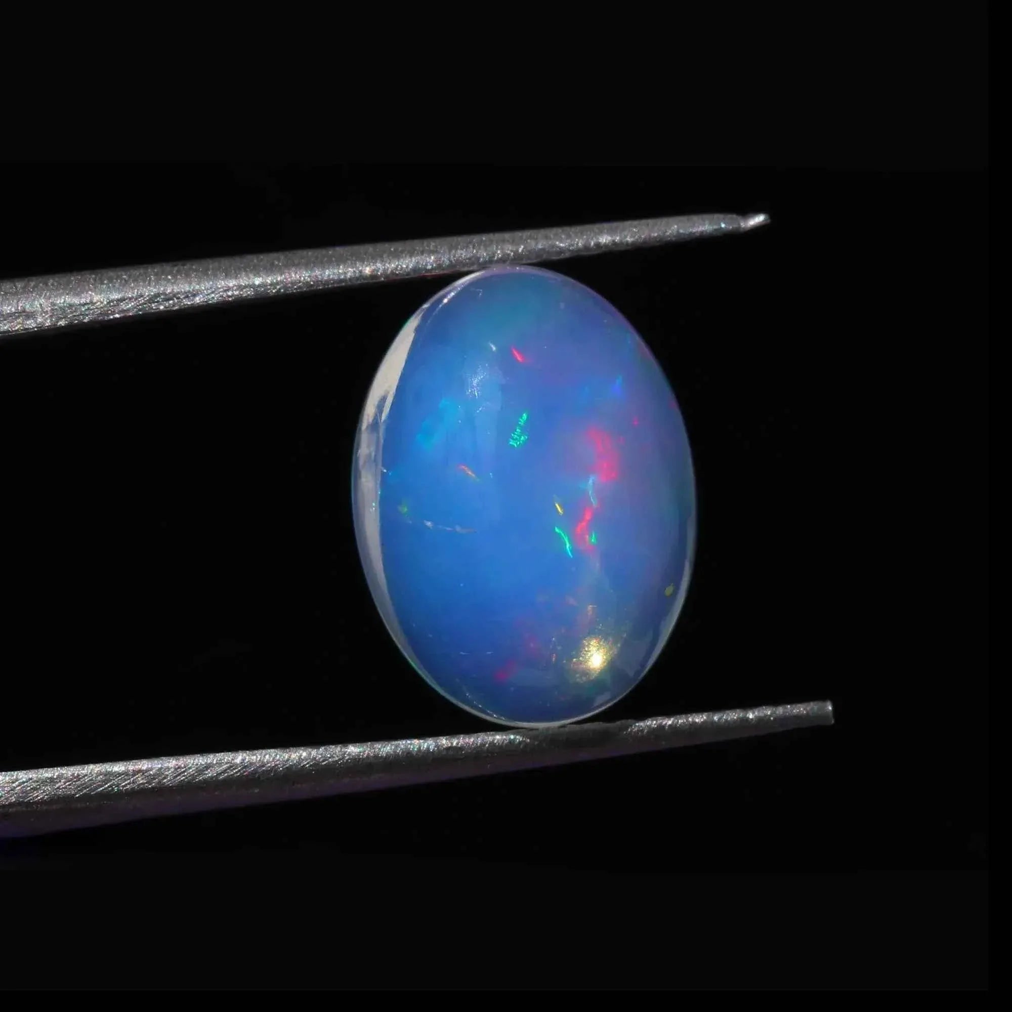 Ethiopian Opal Cabochon: 2.96ct Rainbow Fire Gemstone, 10x14mm loose gemstones