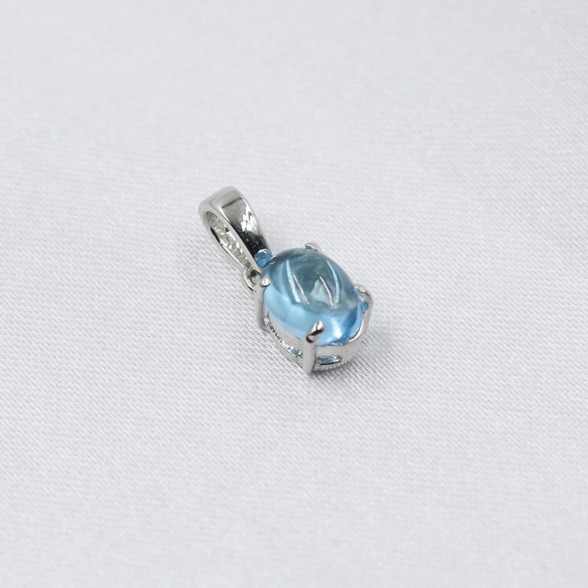 Swiss Blue Topaz Pendant: Oval Sterling Silver December Birthstone