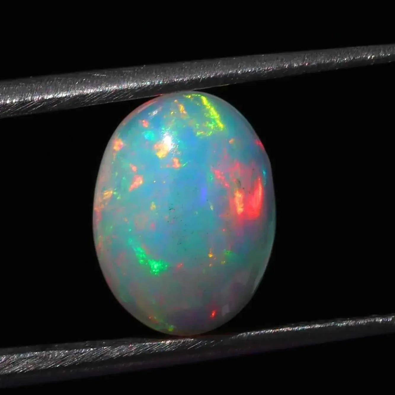 2.25 Carat White Ethiopian Opal Cabochon: Oval Loose Gemstone loose gemstones