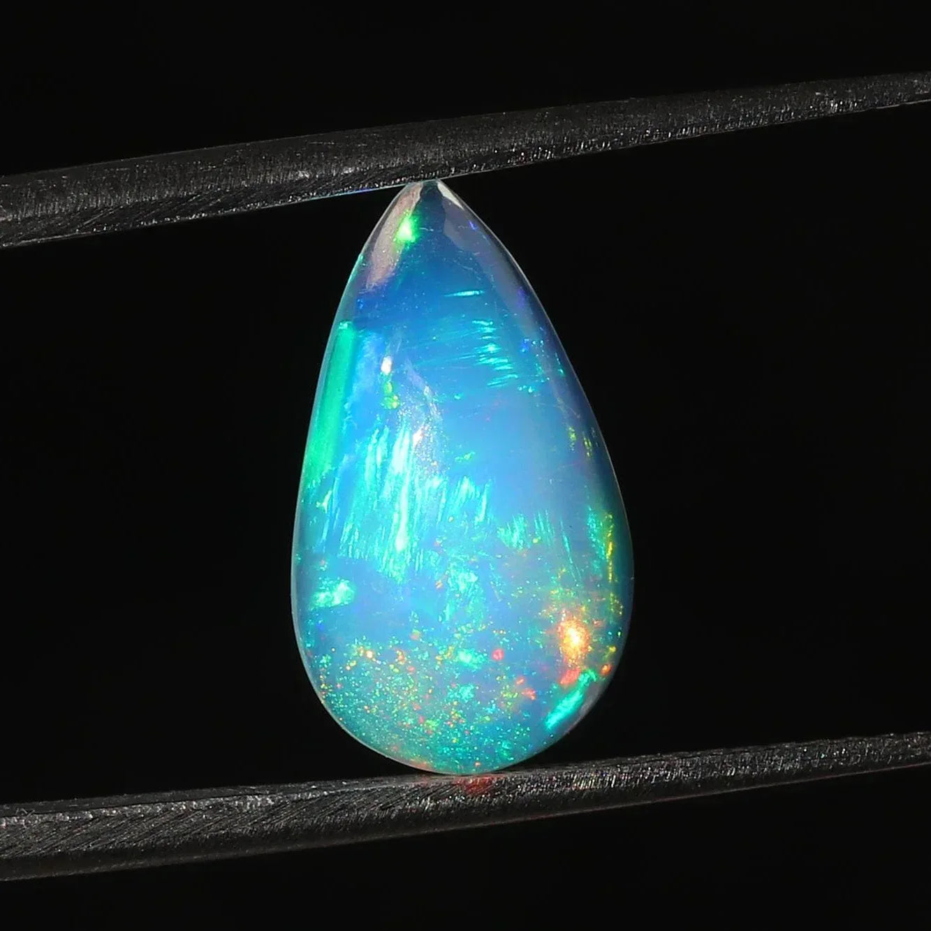 Welo Ethiopian Opal Cabochon: Pear-Cut Fire Opal Gemstone, 3 Cts loose gemstones