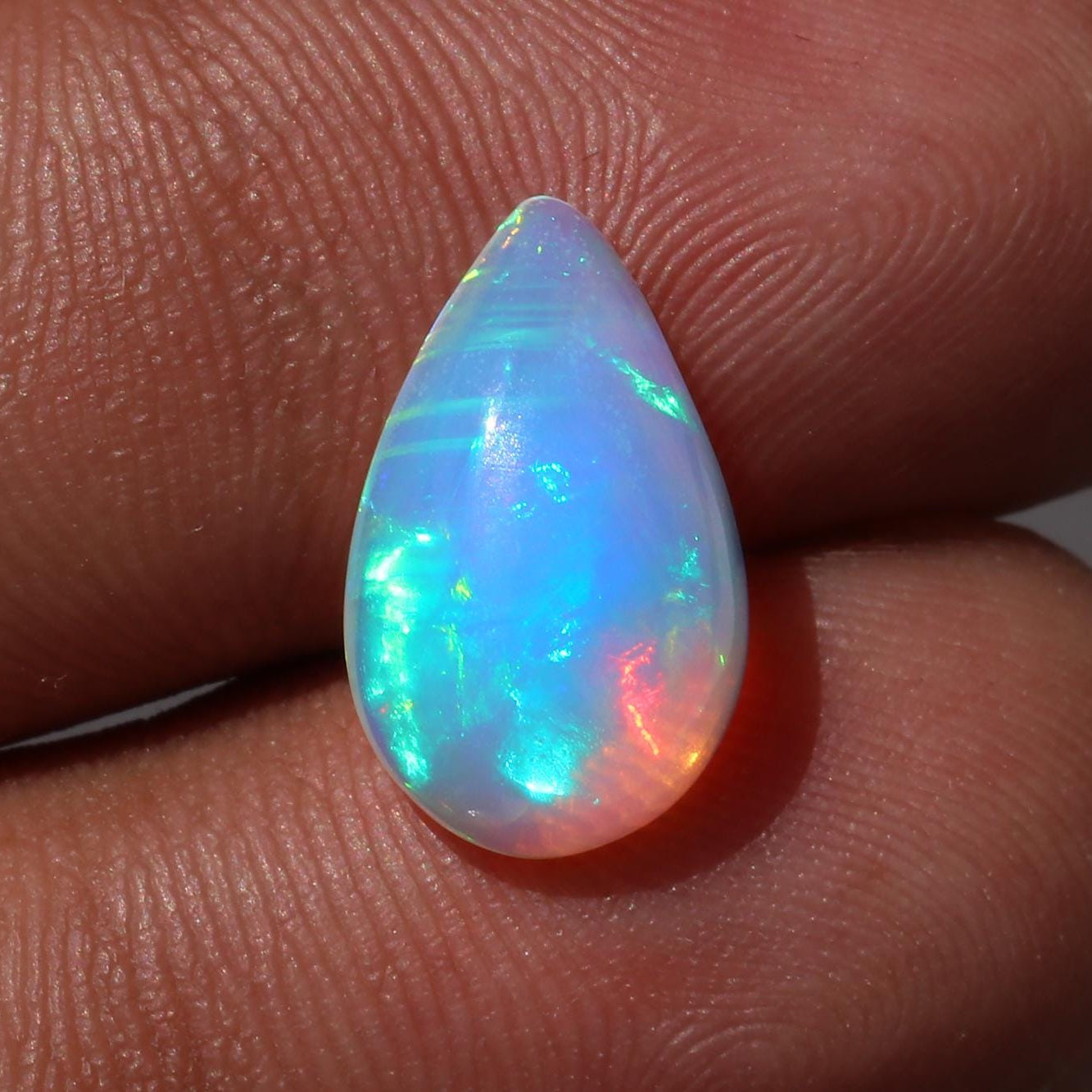 Welo Opal Cabochon: 2.88 Carat Pear Shape Ethiopian Gemstone