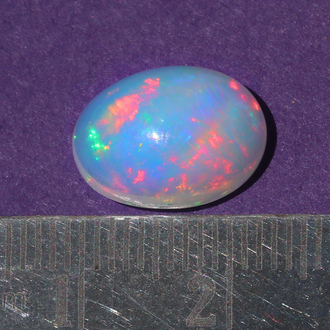 Ethiopian Opal Gemstone: Oval Rainbow Cabochon, 4.02 ct (10x13mm)