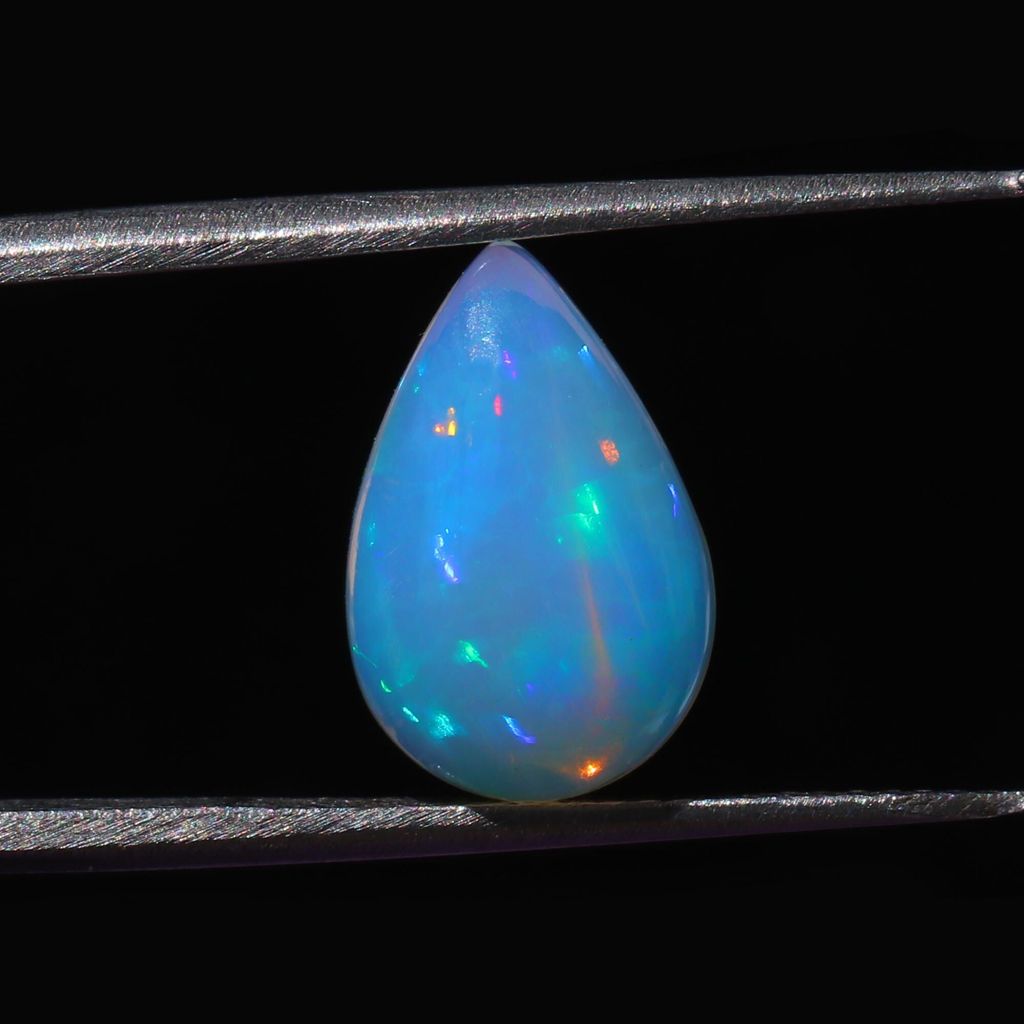3.20 Carat Pear Welo Opal Cabochon: White Ethiopian Gemstone