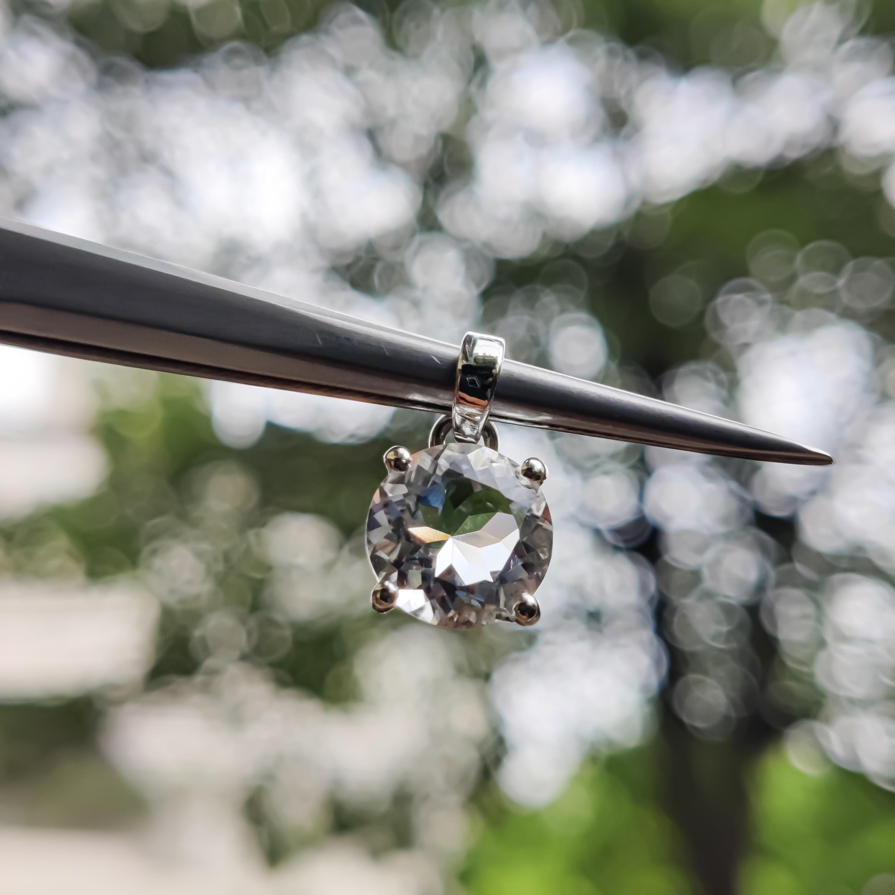 Sterling Silver Petalite Pendant – 9mm Faceted Round Gemstone