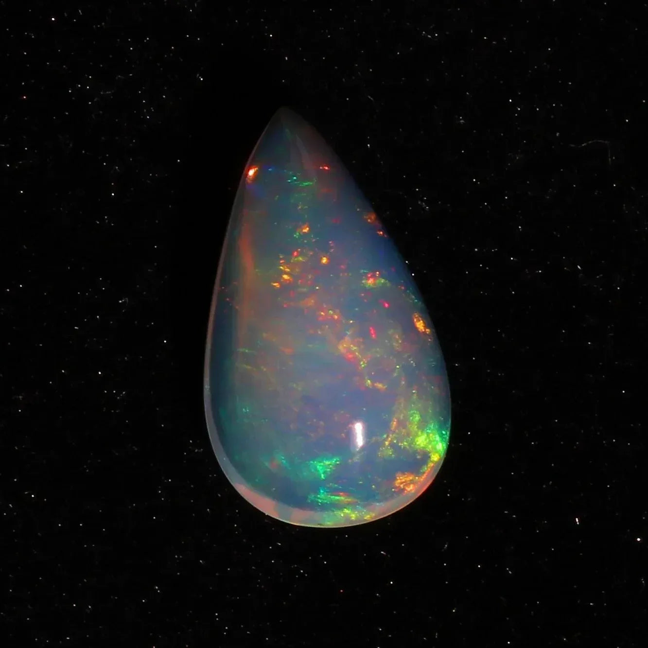 Ethiopian Welo Opal Cabochon: Rainbow Fire Pear-Cut Gemstone, 4.77 CT loose gemstones