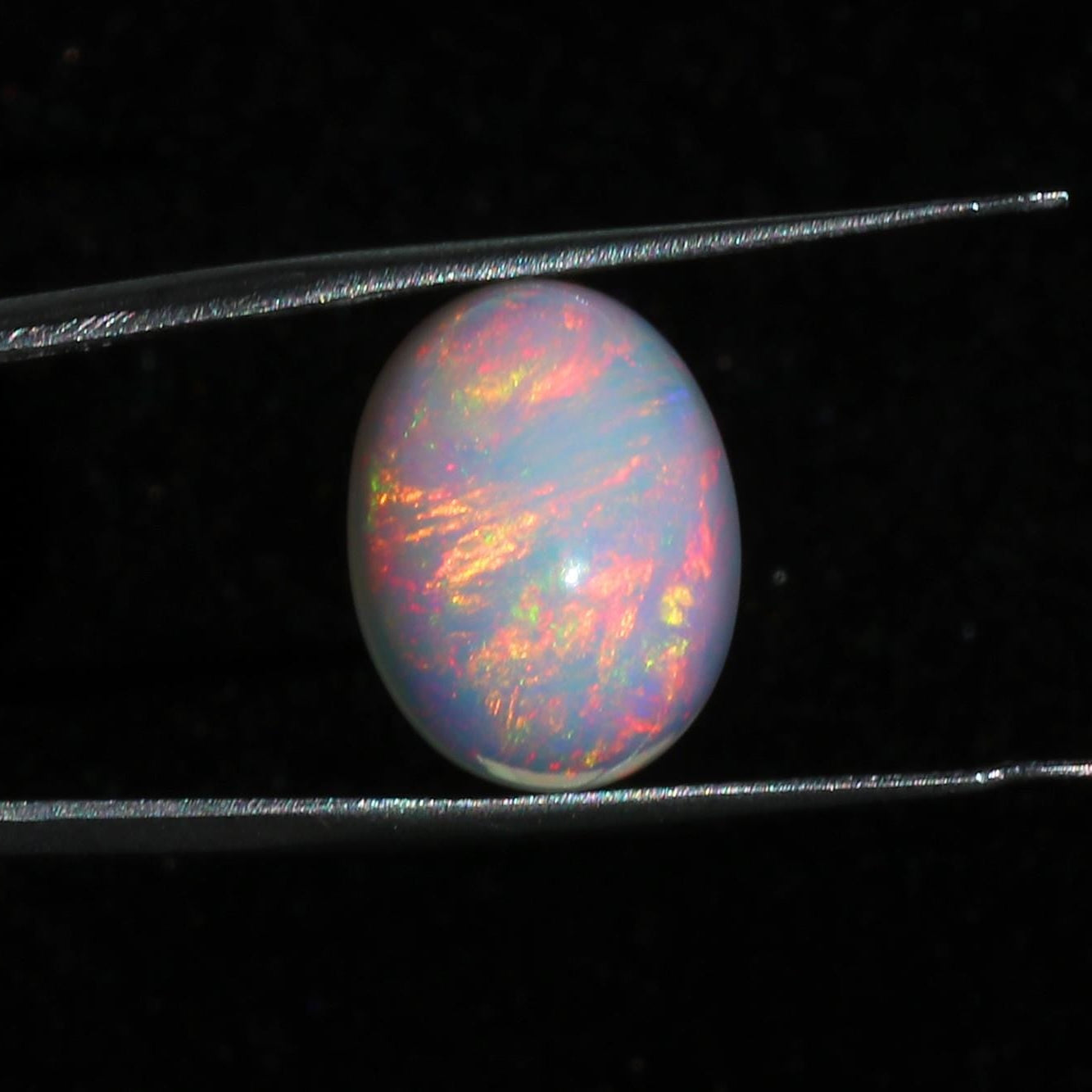 Welo Opal Gemstone: Ethiopian Multi-Fire Oval Cabochon (13x16 mm, 9.61 Cts