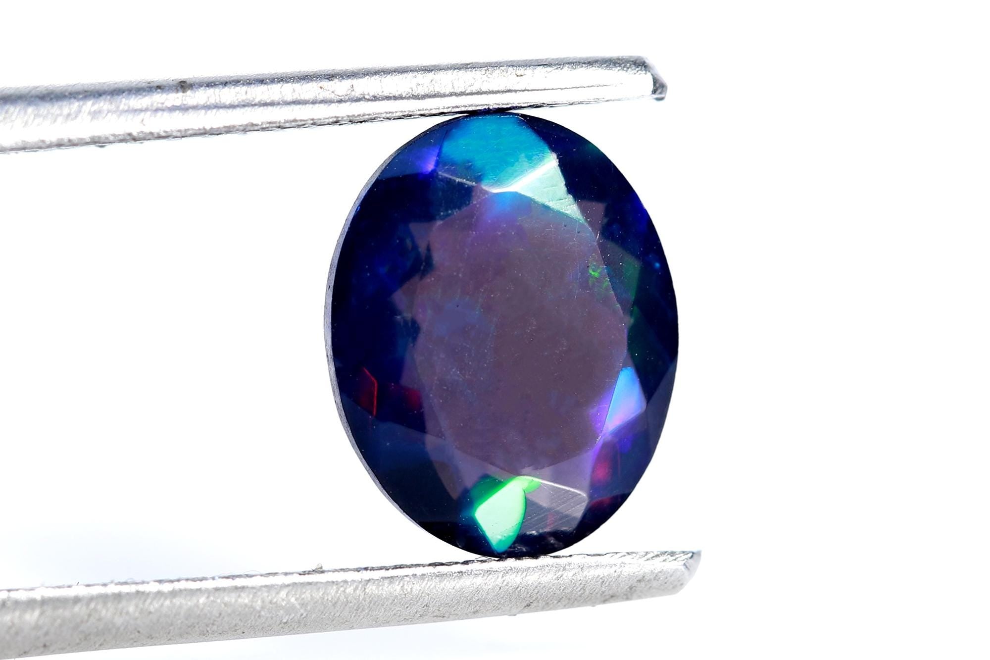 Ethiopian Welo Opal Gemstone: Faceted Black Oval Cut, 1.48 ct