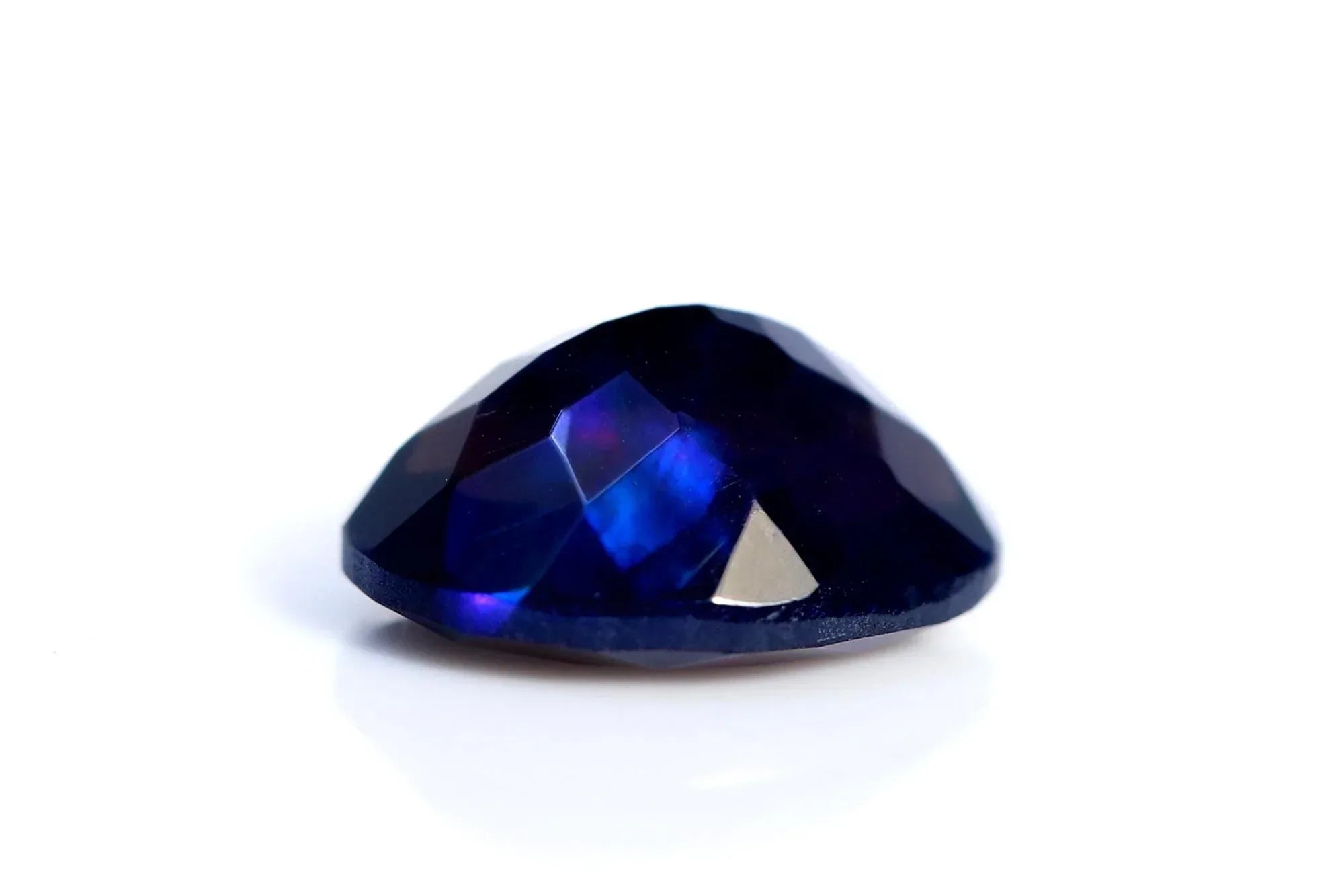 Ethiopian Welo Opal Gemstone: Faceted Black Oval Cut, 1.48 ct loose gemstones