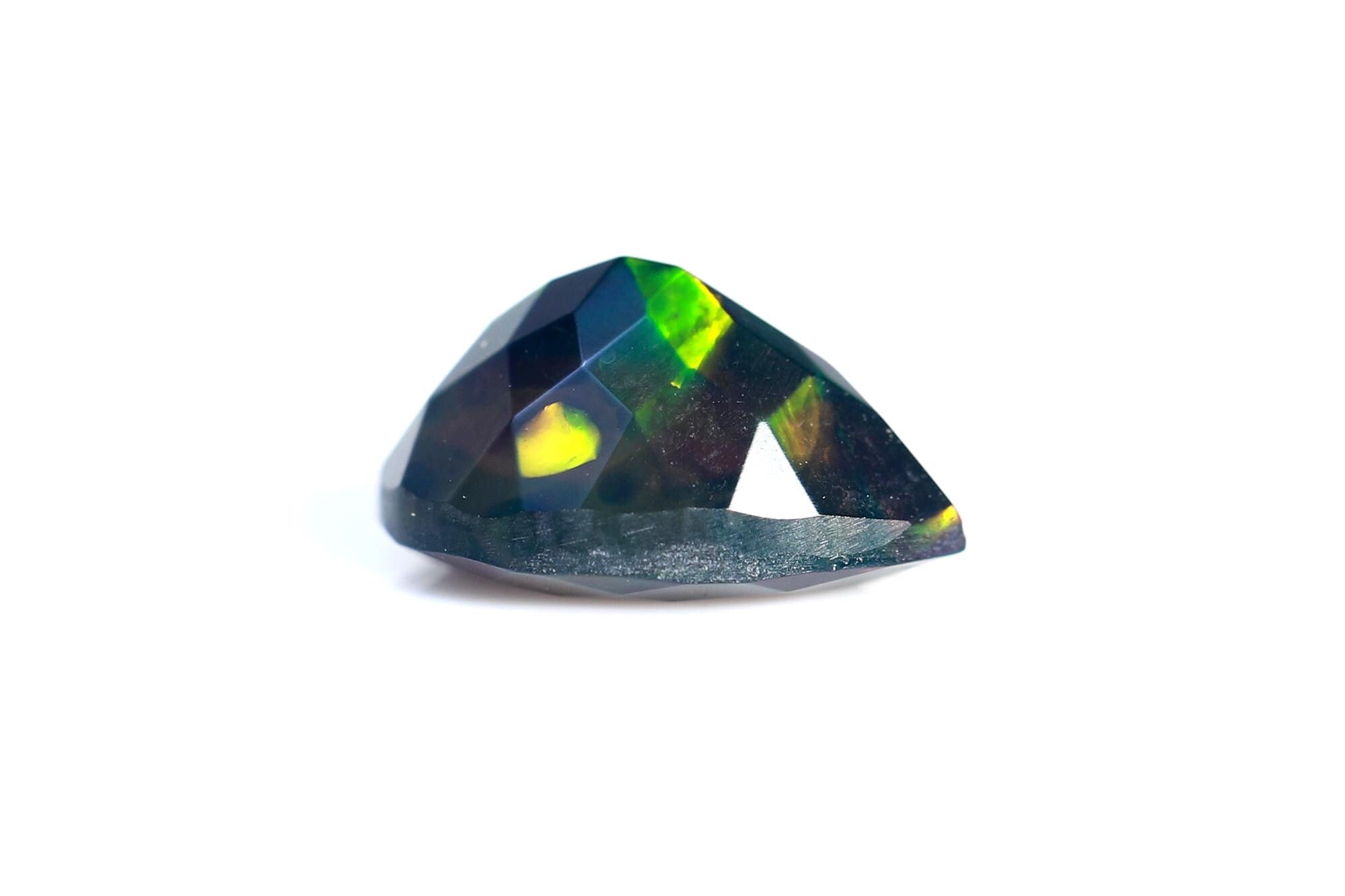 Ethiopian Black Opal Pear Cabochon: Multi-Fire Gemstone (7x10 mm