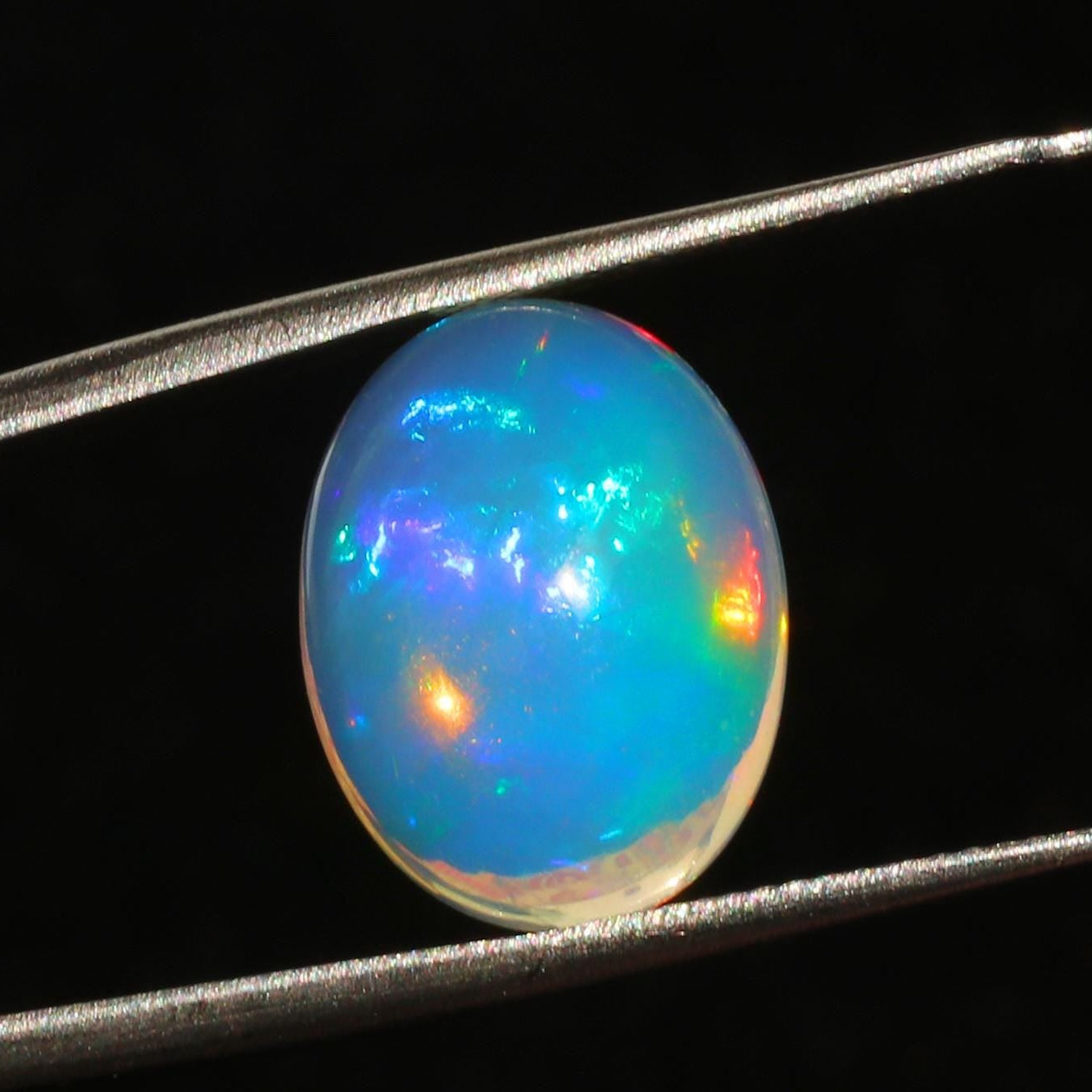 AAA Ethiopian Welo Fire Opal Cabochon: Loose Gemstone, October Birthstone (5.10 Cts, 16x12mm Oval)