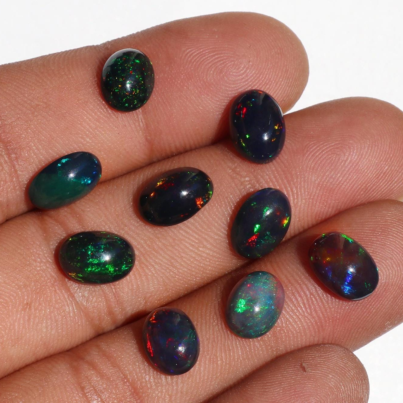 Ethiopian Black Opal Cabochons: Multi-Fire Gemstone Lot (11.53ct, 9pc, 7x10mm