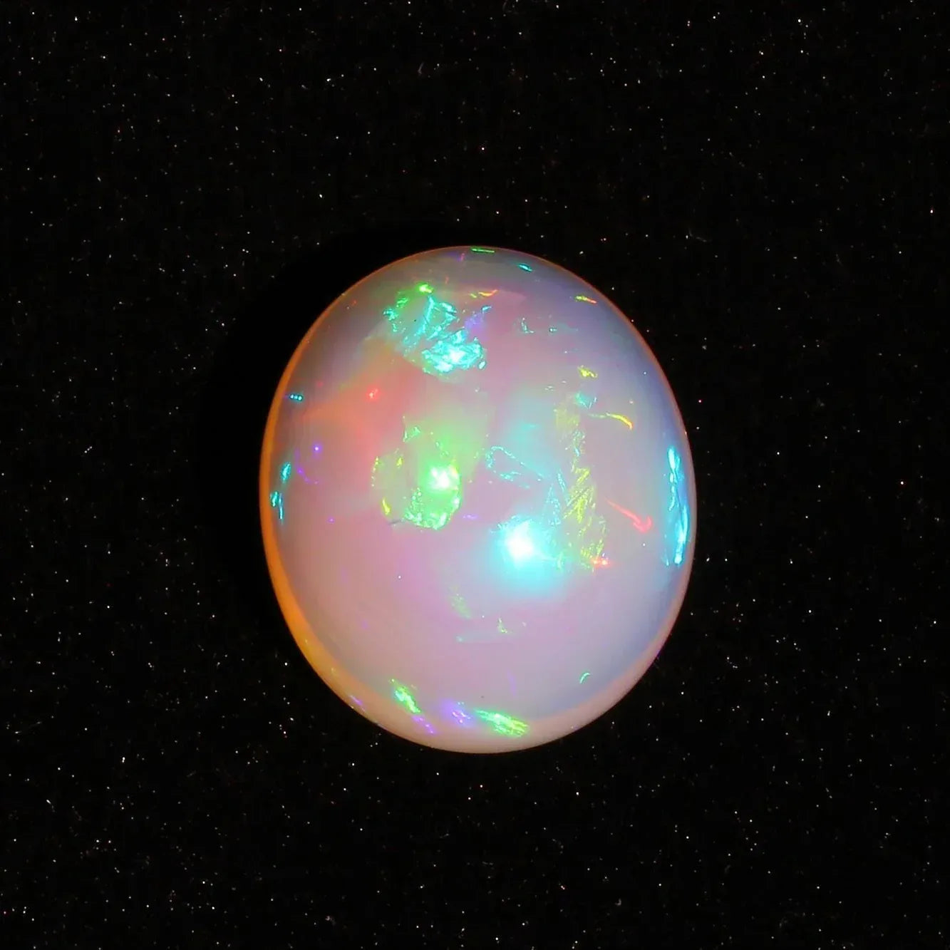 Ethiopian Welo Opal Cabochon: Rainbow Fire Gemstone, 26.7 ct loose gemstones