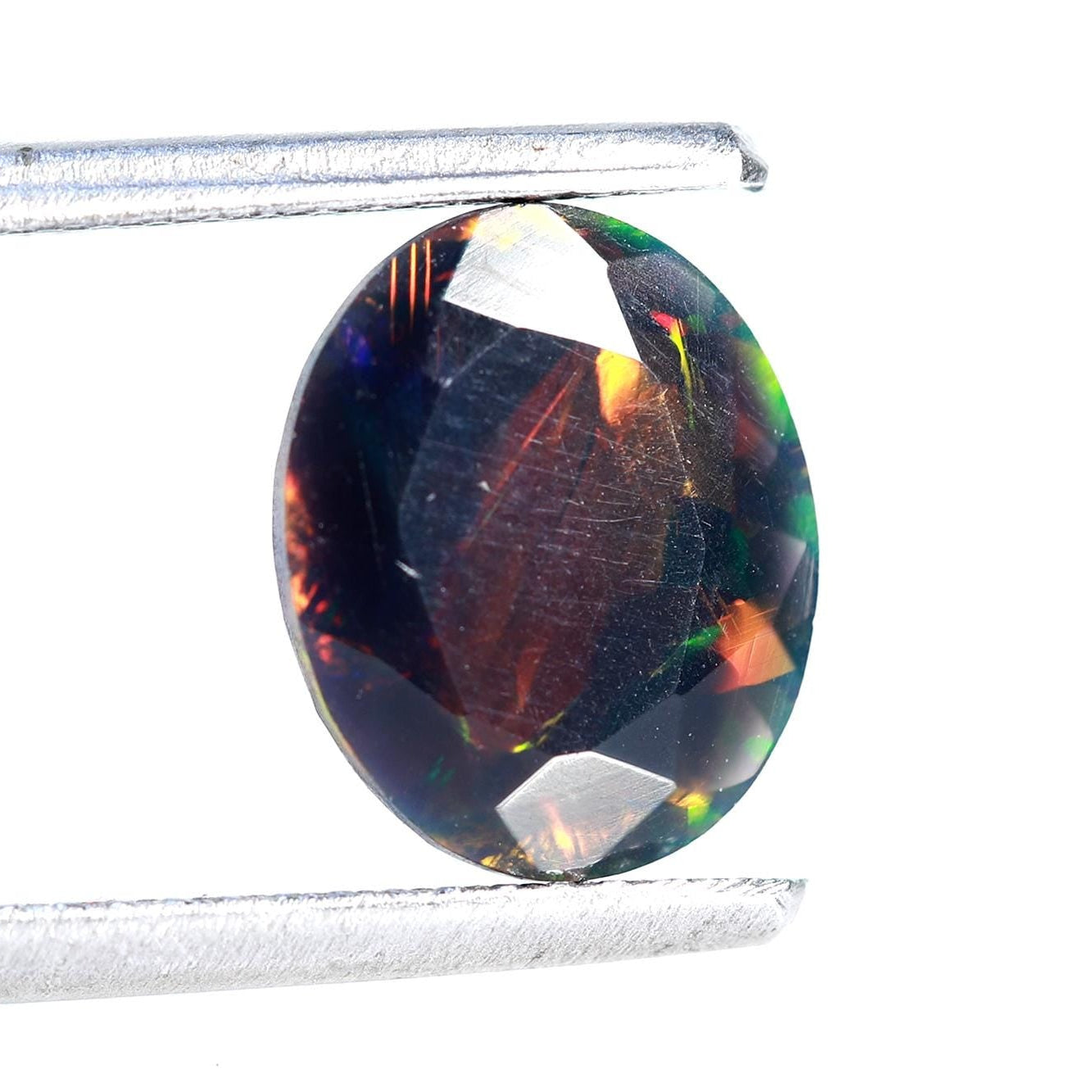 Ethiopian Black Opal Stone: 1.38ct Faceted Oval Cabochon, 8x10mm