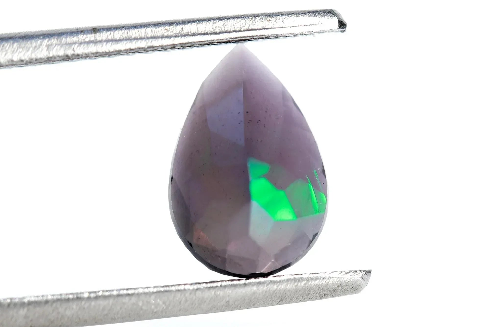 Faceted Black Ethiopian Opal Gemstone: Pear Shape, 7x10mm loose gemstones