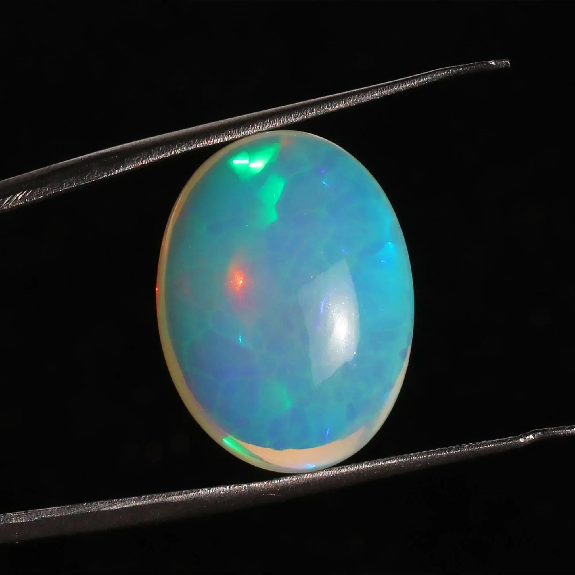 Welo Ethiopian Opal Cabochon: Full Flash Oval Gemstone, 16x21 mm loose gemstones