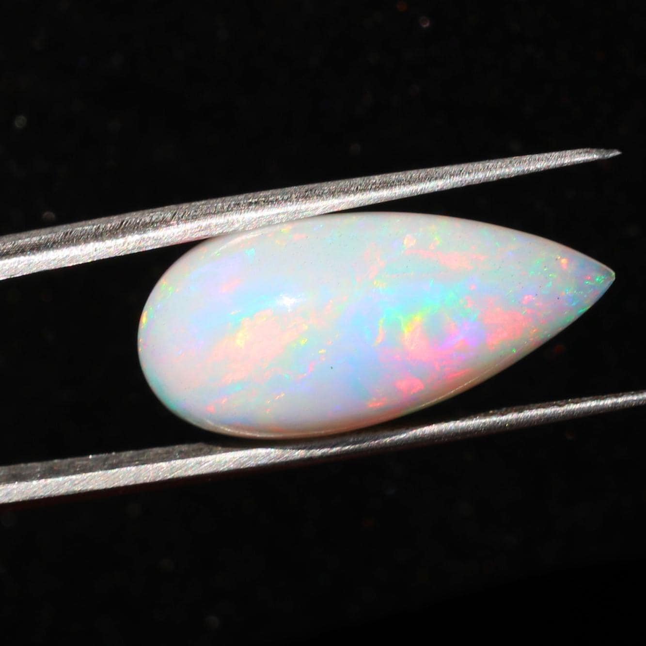 Welo Ethiopian Opal Cabochon: Pear Shape Rainbow Gemstone, October Birthstone (27x12mm, 12 Cts)