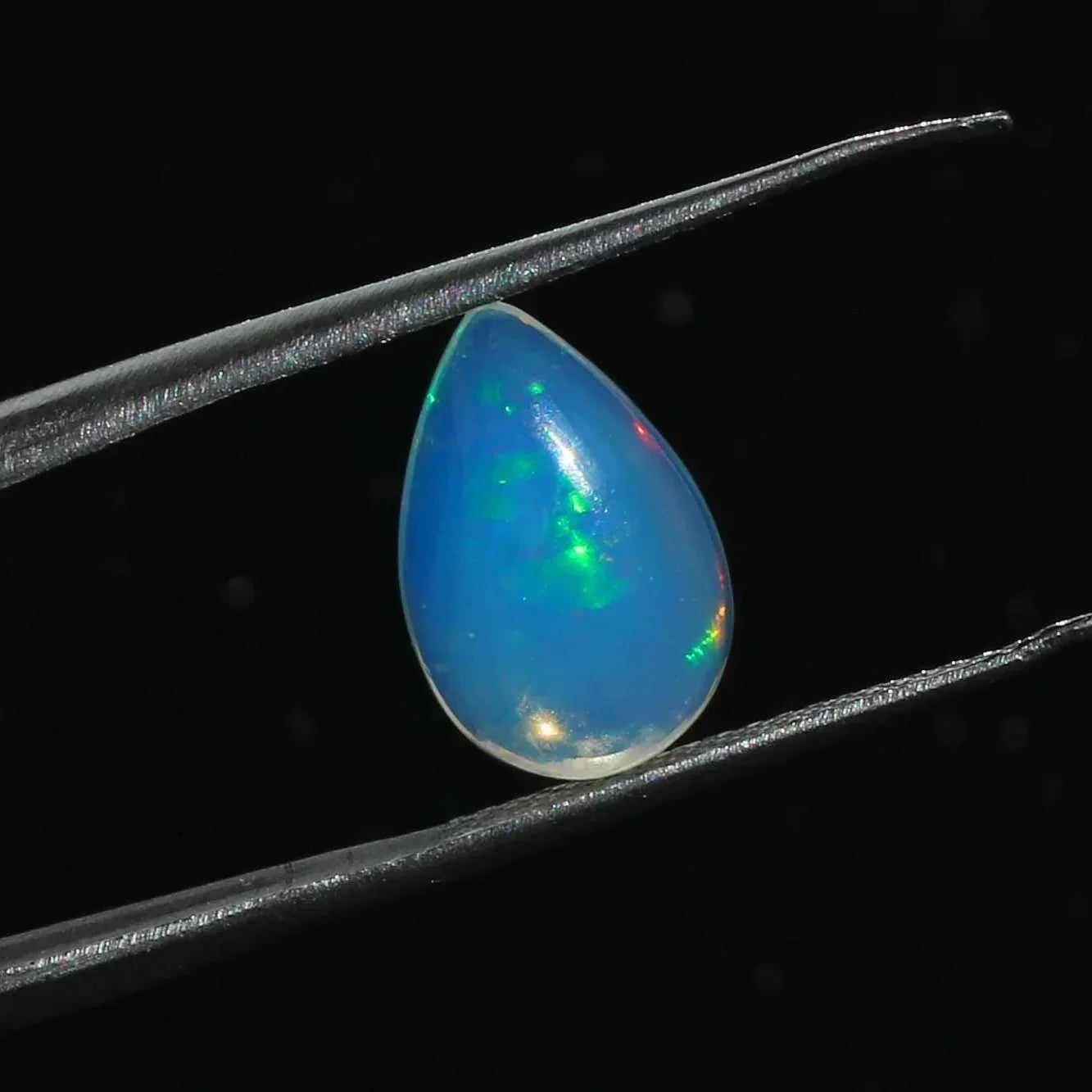 Ethiopian Welo Opal Cabochon: 16x11mm Oval Gemstone, Multi-Fire, 3 Cts loose gemstones