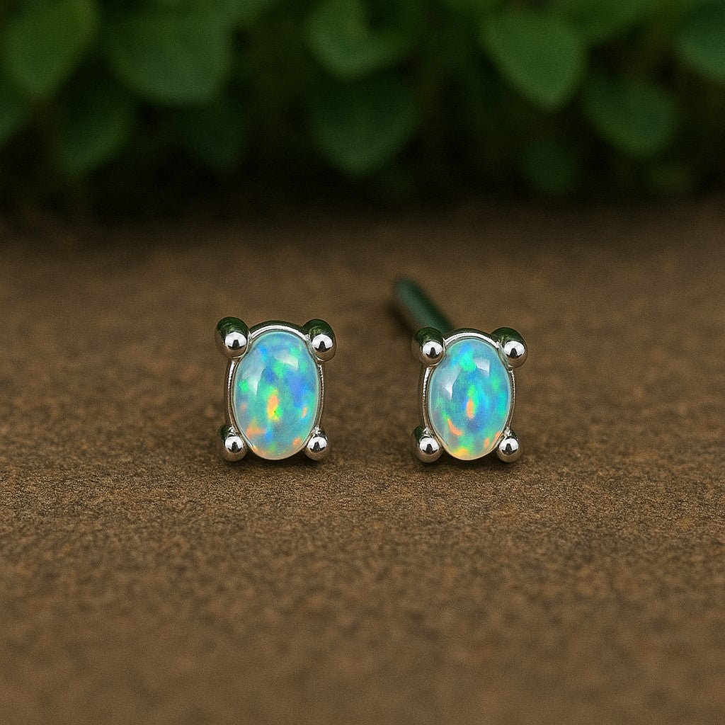 Natural opal stud earrings in 3x4mm cabochon set in 925 sterling silver, minimalist design by Himalya Quartz.