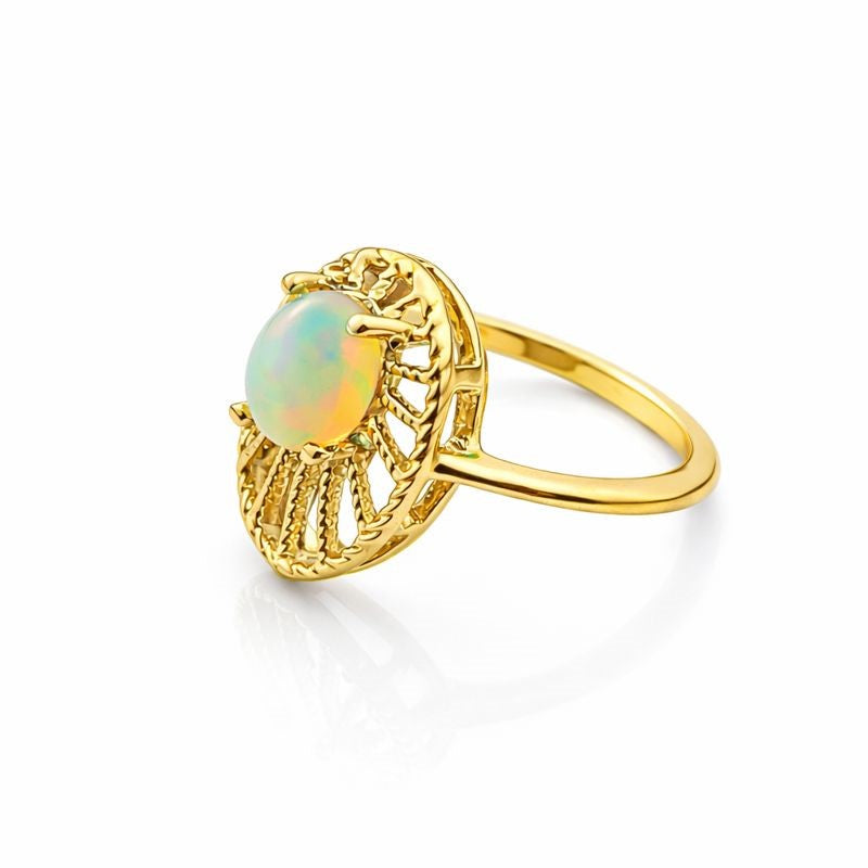 Natural white Ethiopian opal ring with 5x7mm oval cabochon set in sterling silver, handmade statement jewelry by Himalya Quartz.