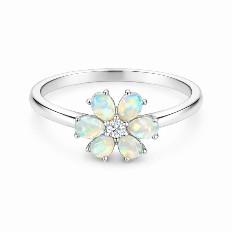White Ethiopian Opal Zircon ring with 3x5mm oval cabochon in sterling silver halo setting, jewelry by Himalya Quartz