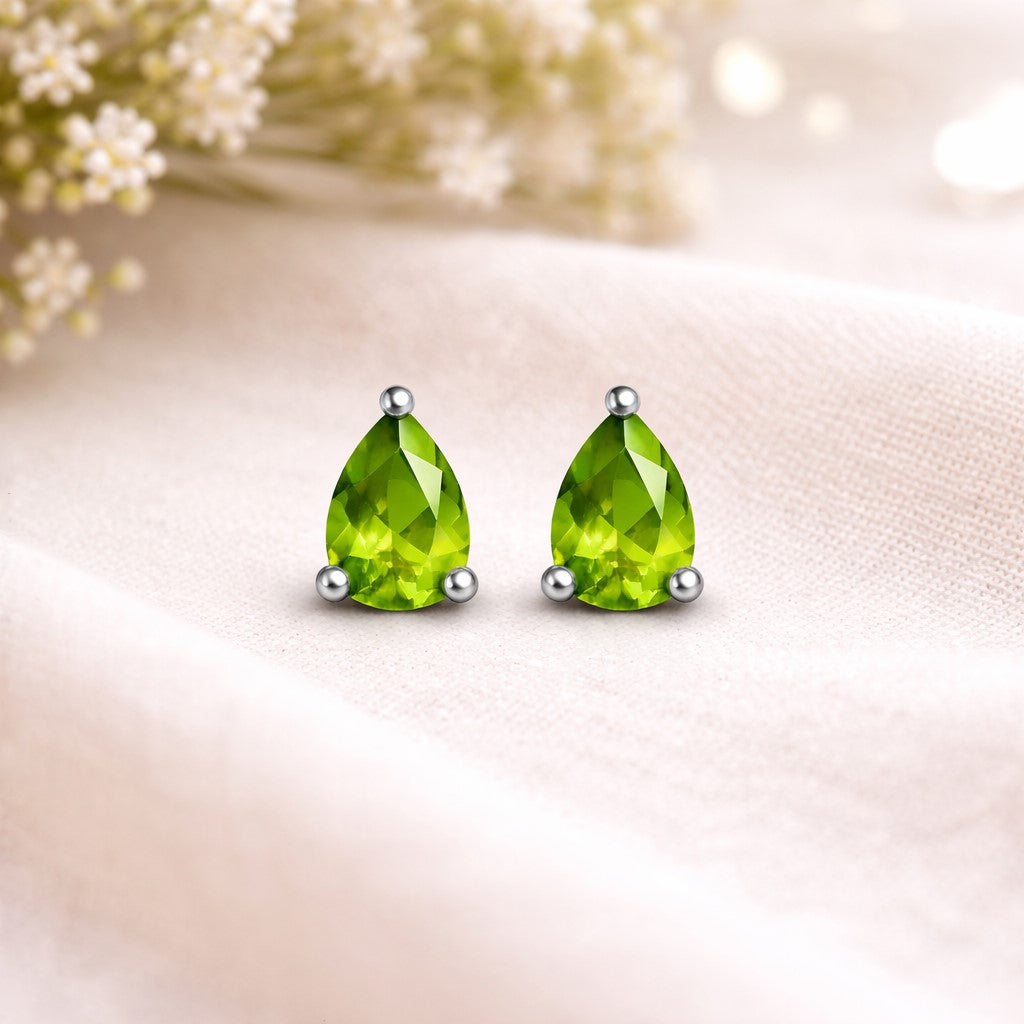 Natural Peridot pear stud earrings in silver with tiny green gemstones, sterling silver jewelry for women.