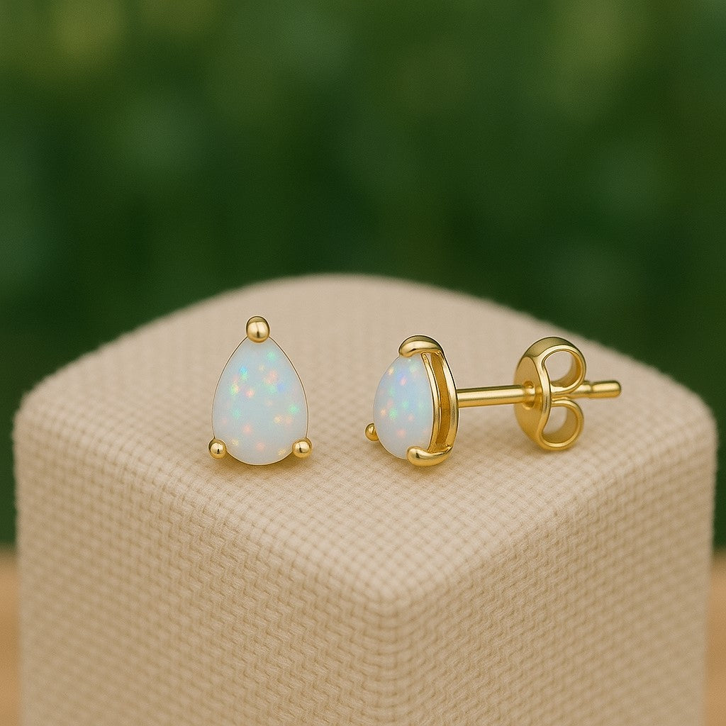 Himalya Quartz Pear Opal Stud Earrings in 925 Sterling Silver with minimalist pear-shaped natural opal cabochons.