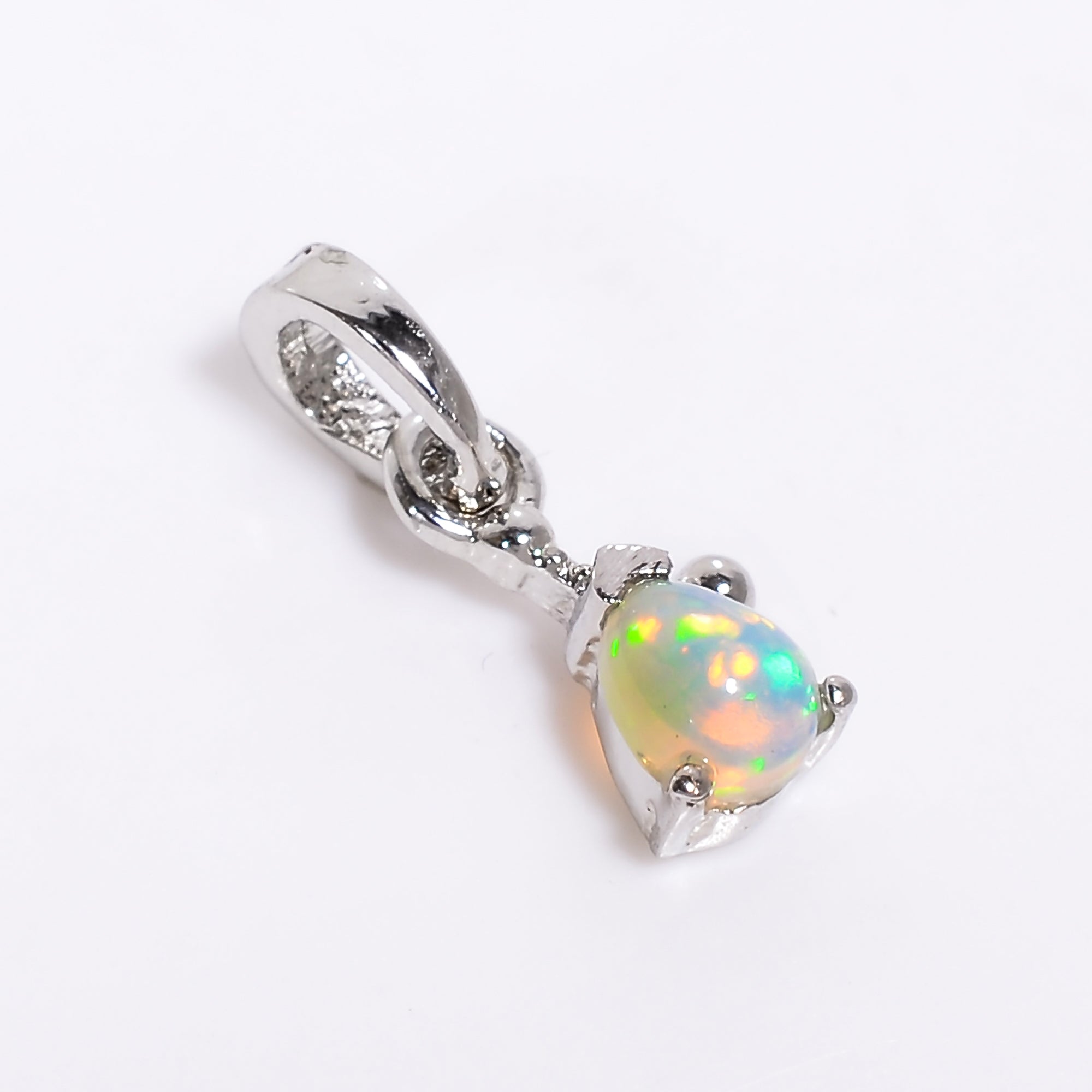 Himalya Quartz opal pendant necklace featuring a pear-shaped sterling silver opal cabochon, October birthstone jewelry.