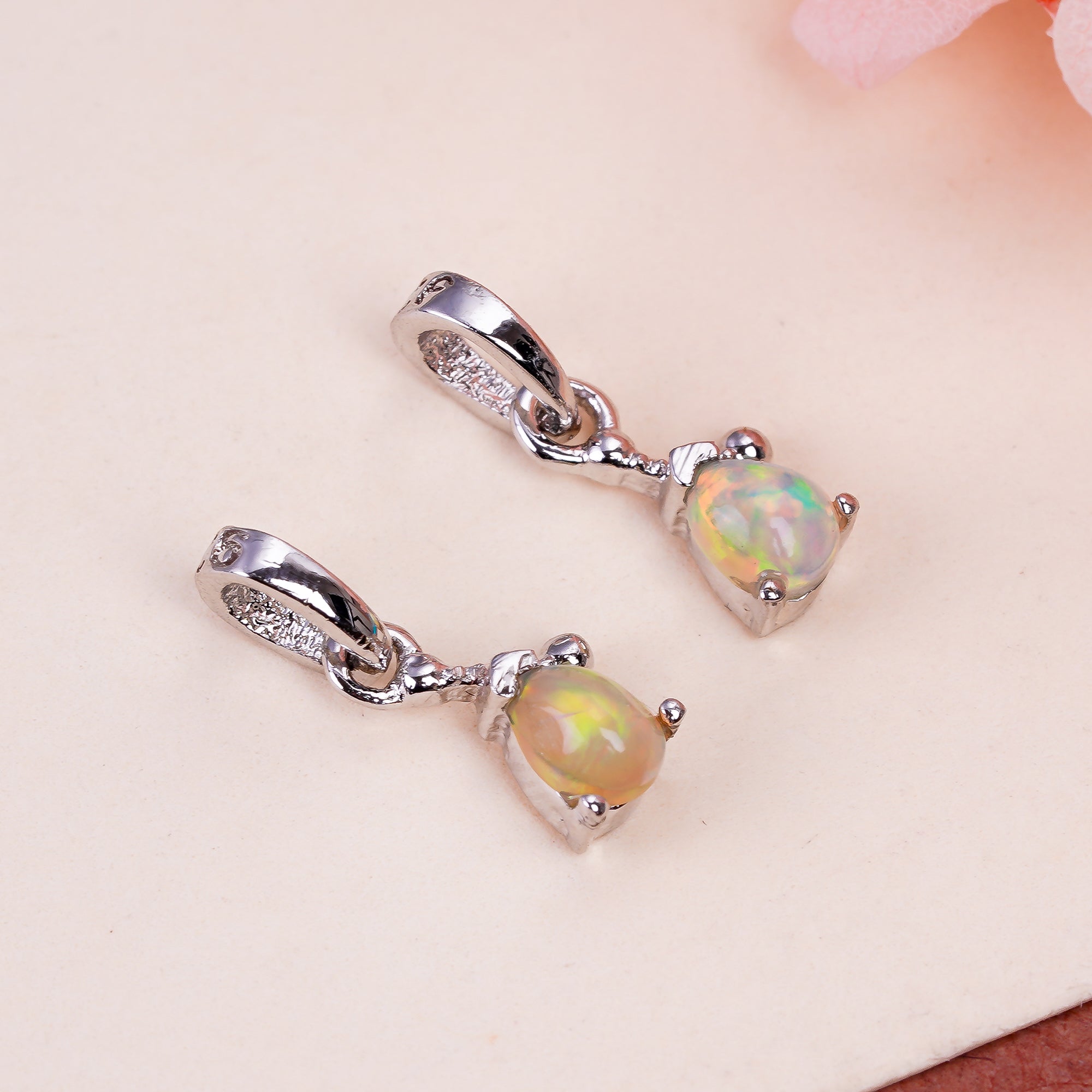 Himalya Quartz sterling silver opal pear pendant necklace featuring a vibrant October birthstone cabochon.