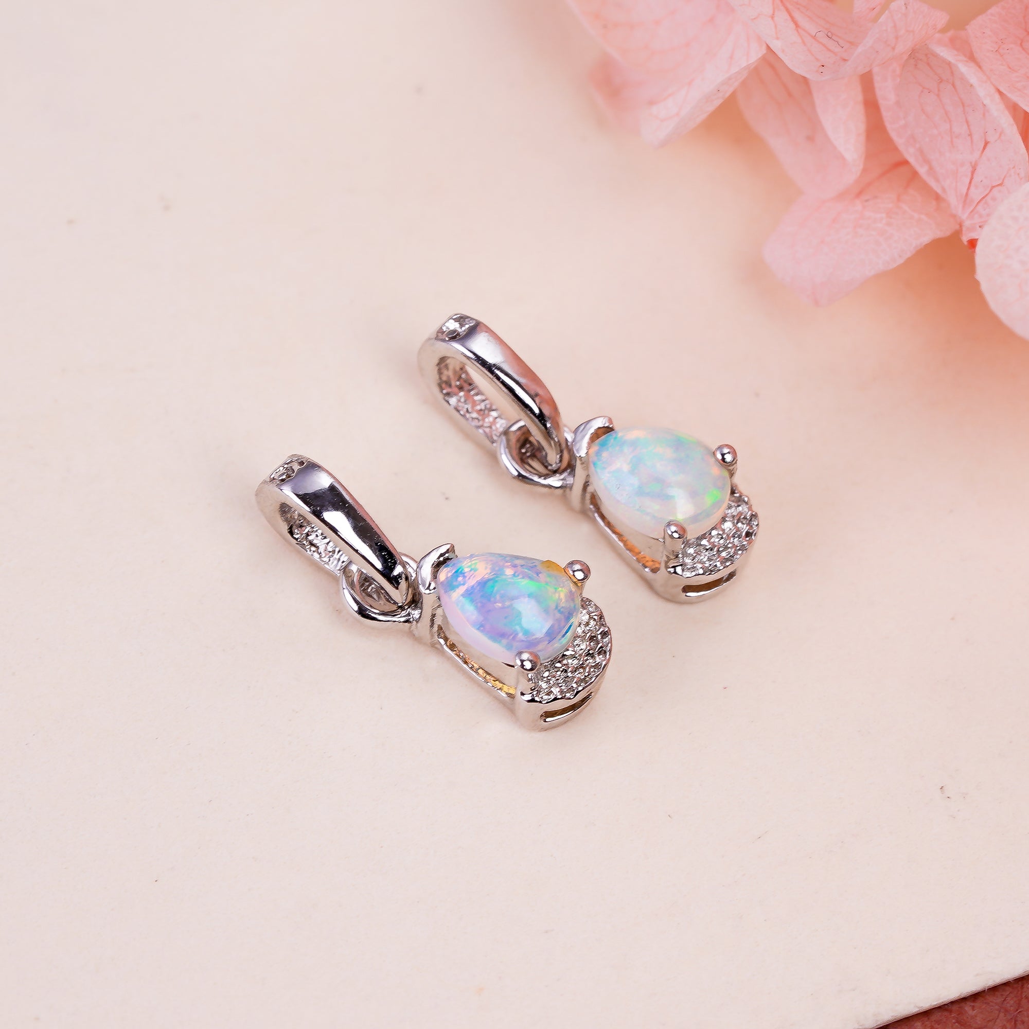 Natural opal pear pendant on a 925 sterling silver chain, minimalist design, from Himalya Quartz, ideal for elegant jewelry gifting.