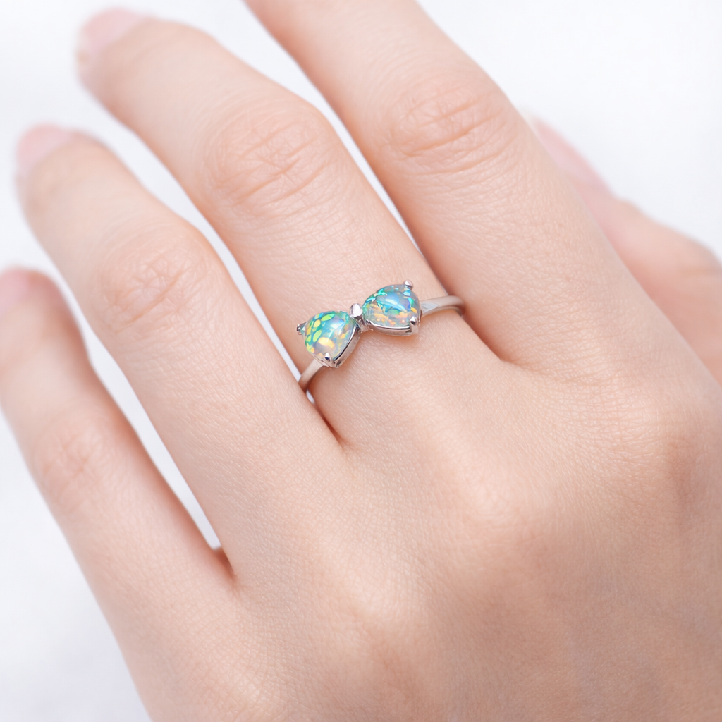 Natural Ethiopian opal ring in 925 sterling silver, featuring a pear-shaped opal gemstone, handmade minimalist gemstone jewelry.