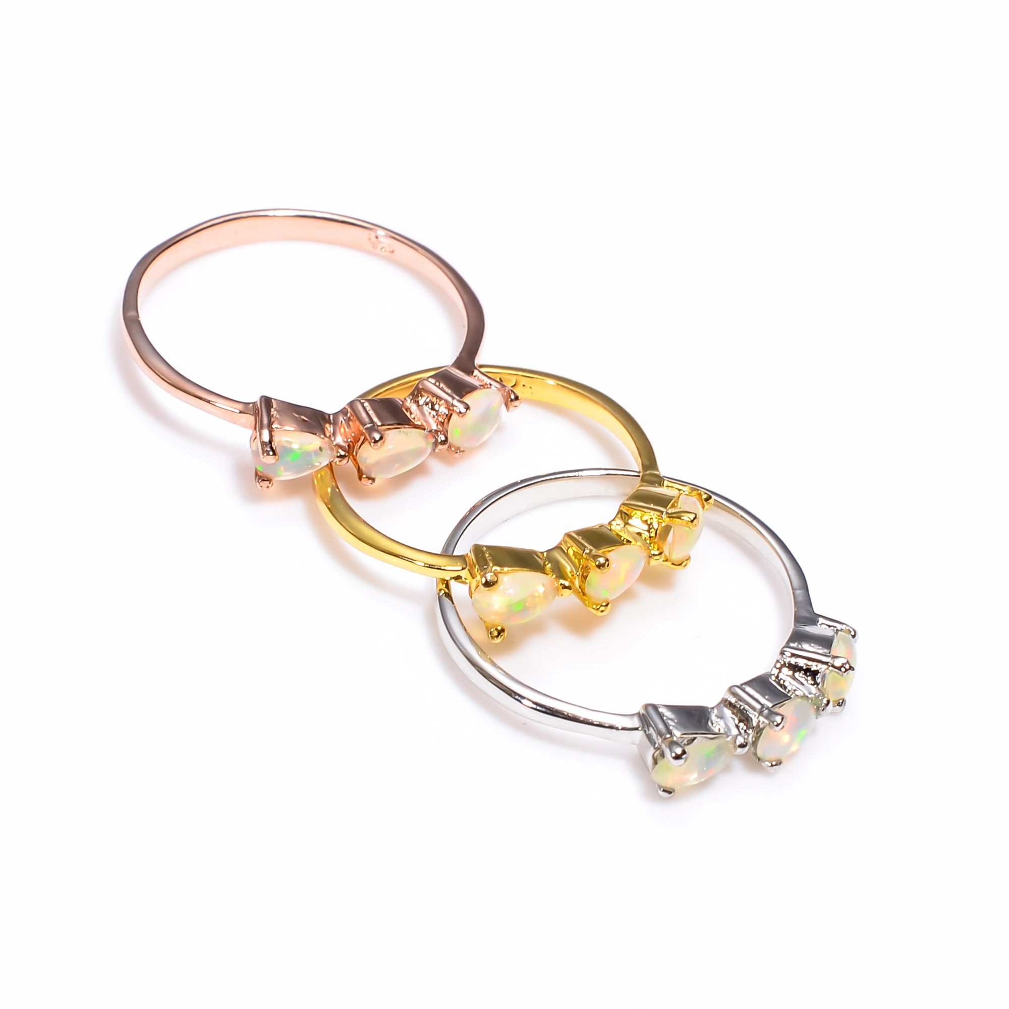 Himalya Quartz three-stone Ethiopian opal ring with 3x5mm pear-shaped stones in sterling silver, boho handmade jewelry for women.
