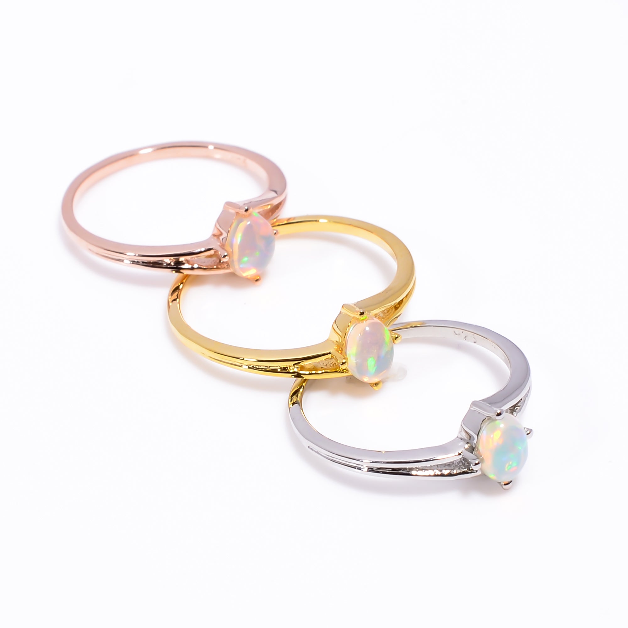 Minimal oval Ethiopian opal ring with 4x6mm opal, sterling silver band, handmade gemstone jewelry by Himalya Quartz.