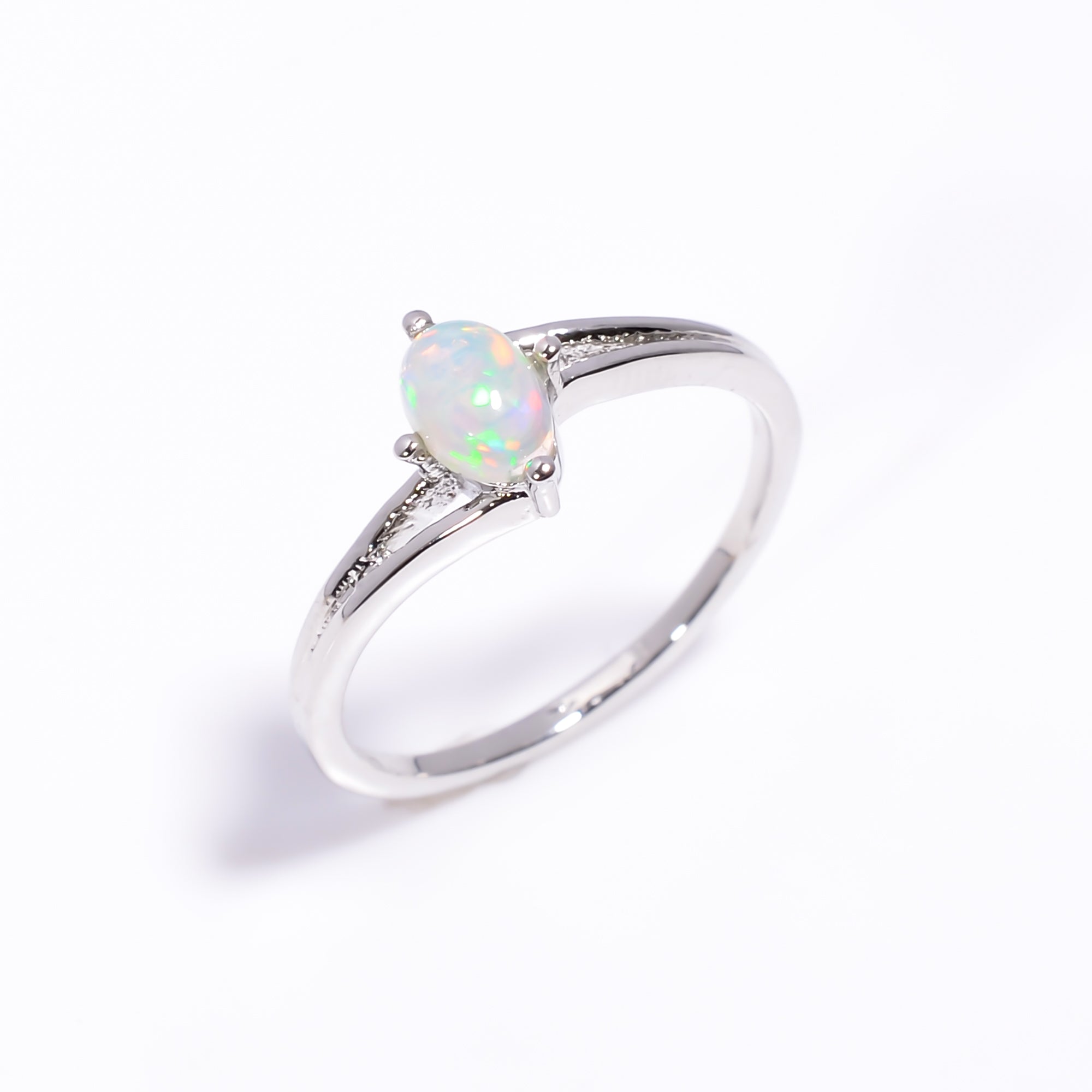 Minimal oval Ethiopian opal ring with 4x6mm opal gemstone set in 925 sterling silver, handcrafted everyday jewelry by Himalya Quartz