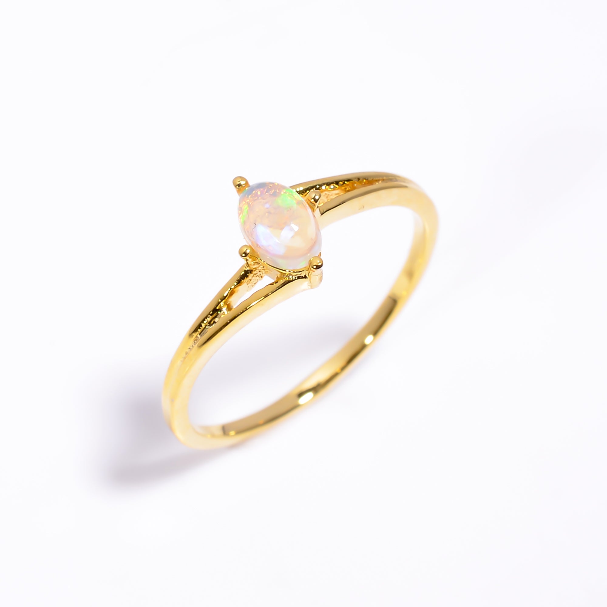 Minimal oval Ethiopian opal ring in 925 sterling silver with a 4x6mm gemstone, handmade everyday jewelry by Himalya Quartz.