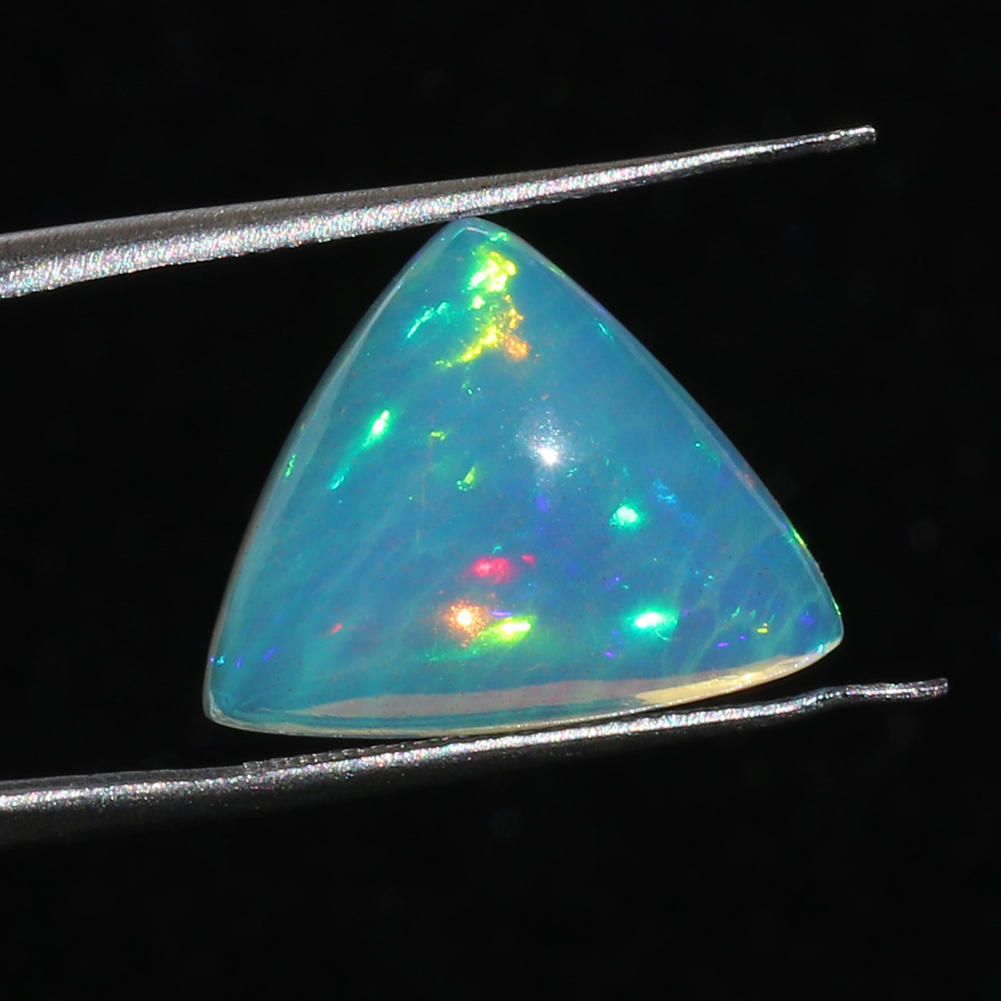 Ethiopian Welo Opal Cabochon: Honeycomb Gemstone for Jewelry Making (7.6ct, 17mm Triangle