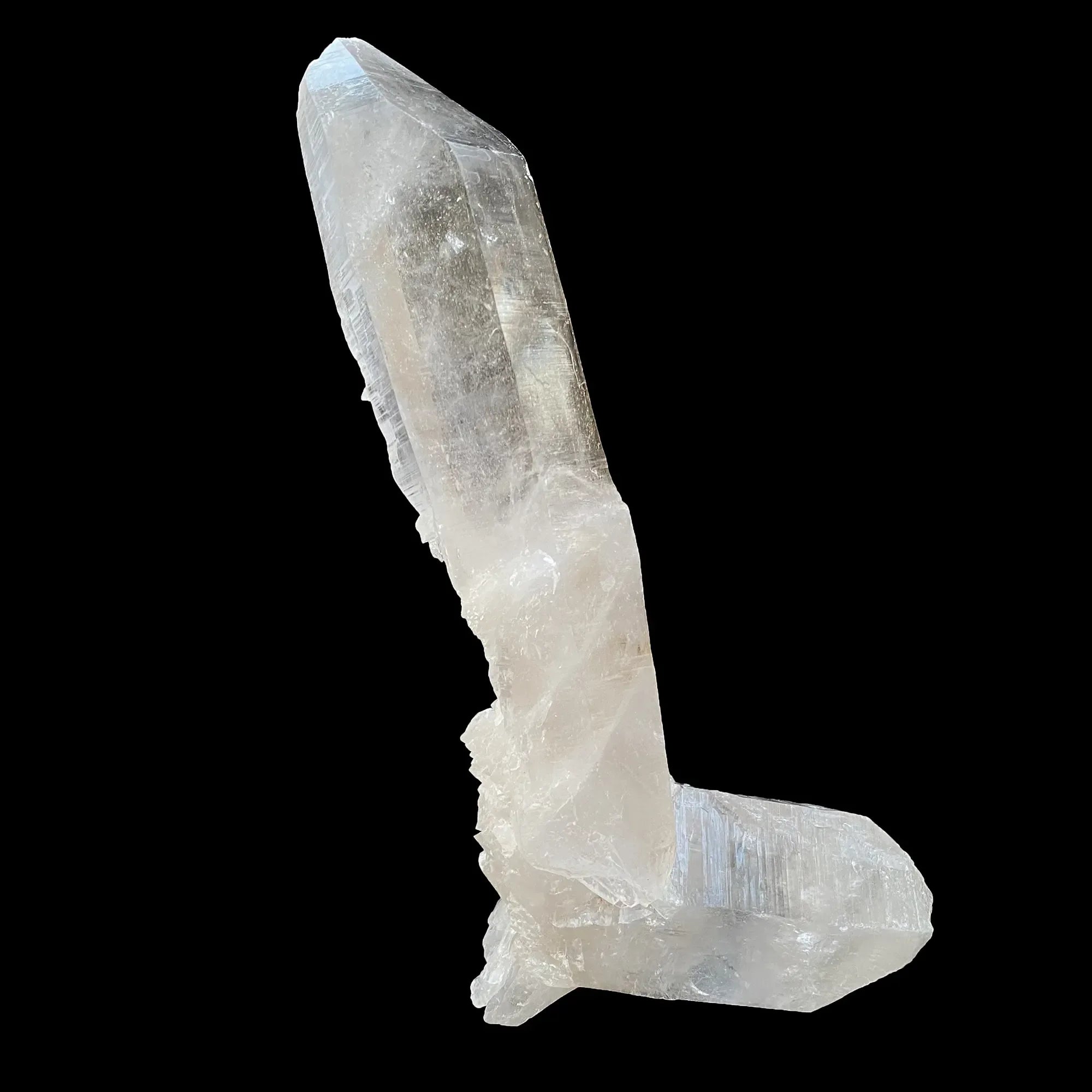 White Himalayan Quartz crystal cluster display, natural healing stone from Himalya Quartz showcasing raw energy and intricate formations.