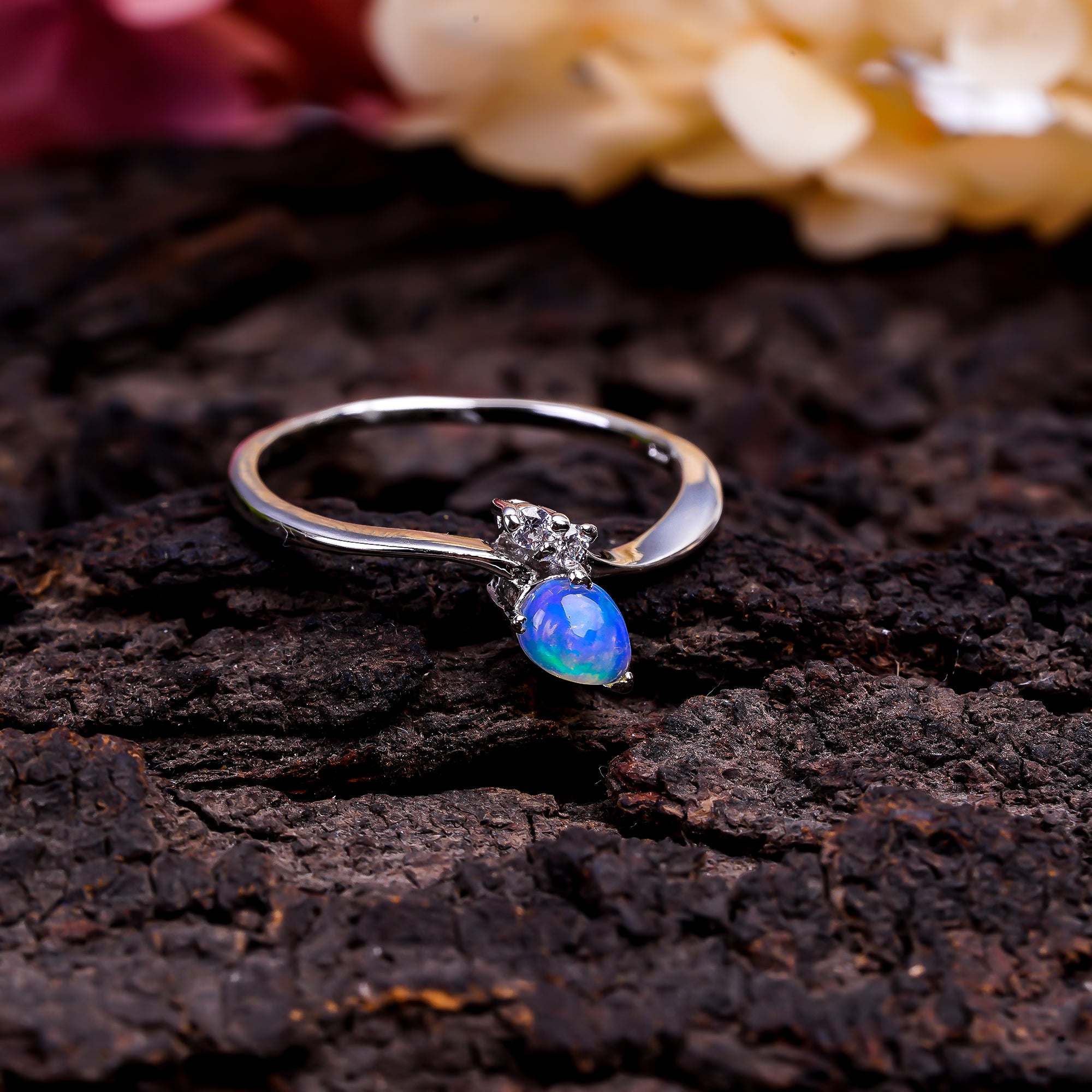 Natural Ethiopian opal zircon ring in 925 sterling silver with pear cut gemstone, minimalist design for women by Himalya Quartz.