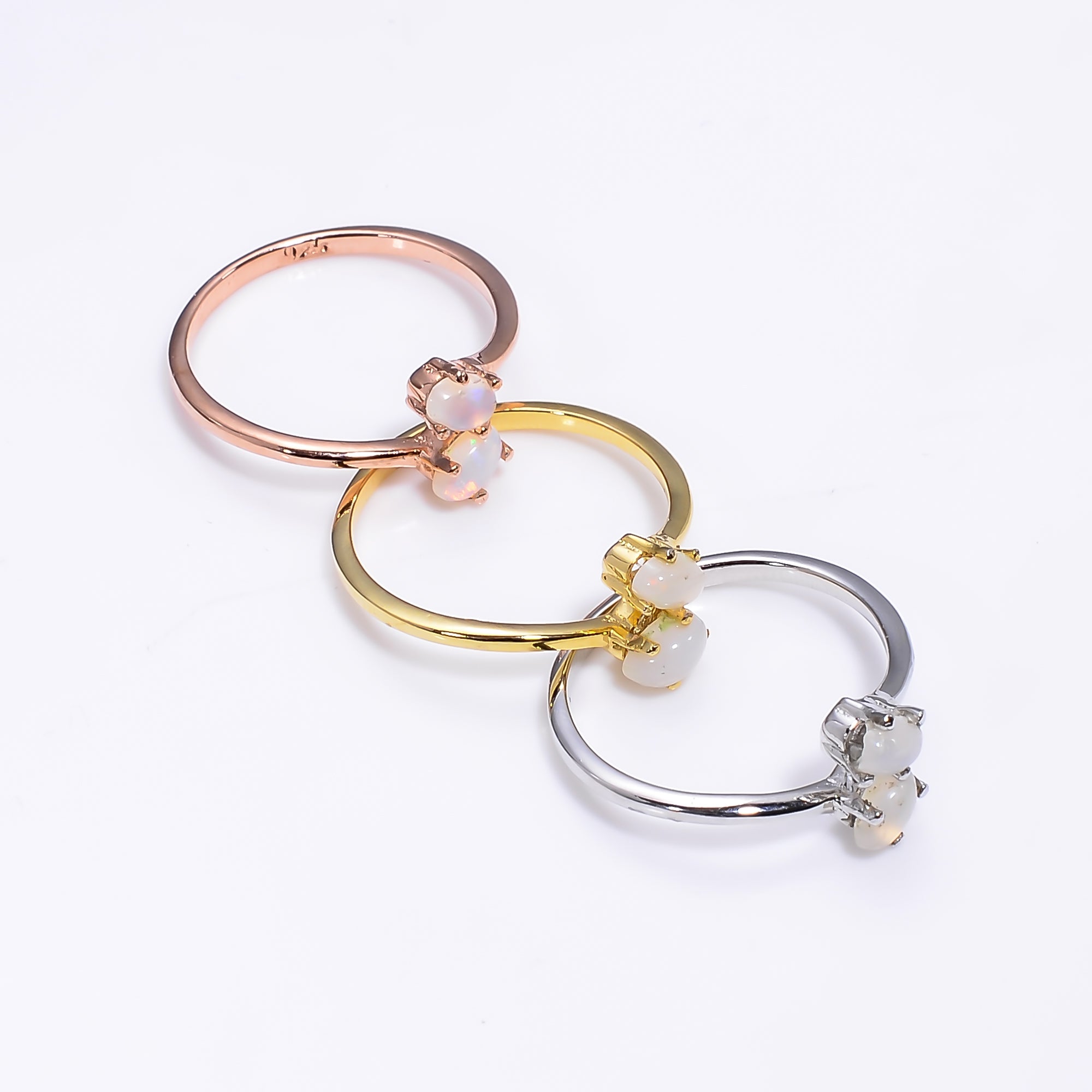 Natural Ethiopian Opal oval ring in 925 sterling silver with a 3x5mm opal, minimalist design, perfect as a women's promise ring.