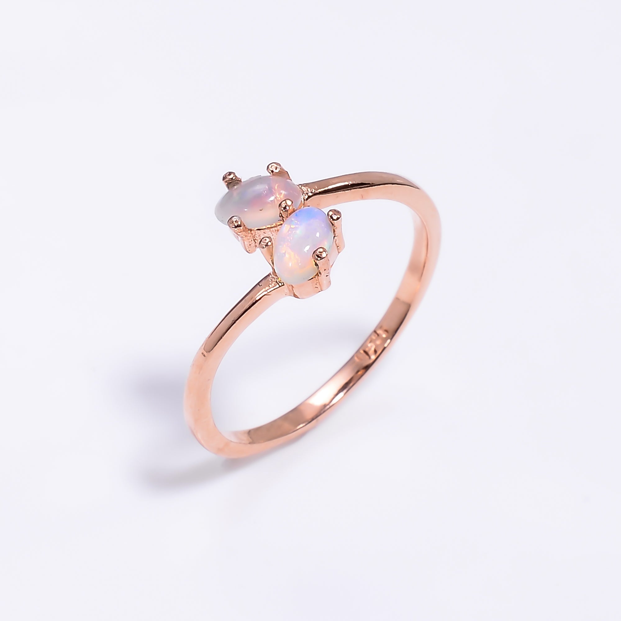 Natural Ethiopian opal oval ring in 925 sterling silver with a 3x5mm opal, minimalist design, perfect as a gift for women.